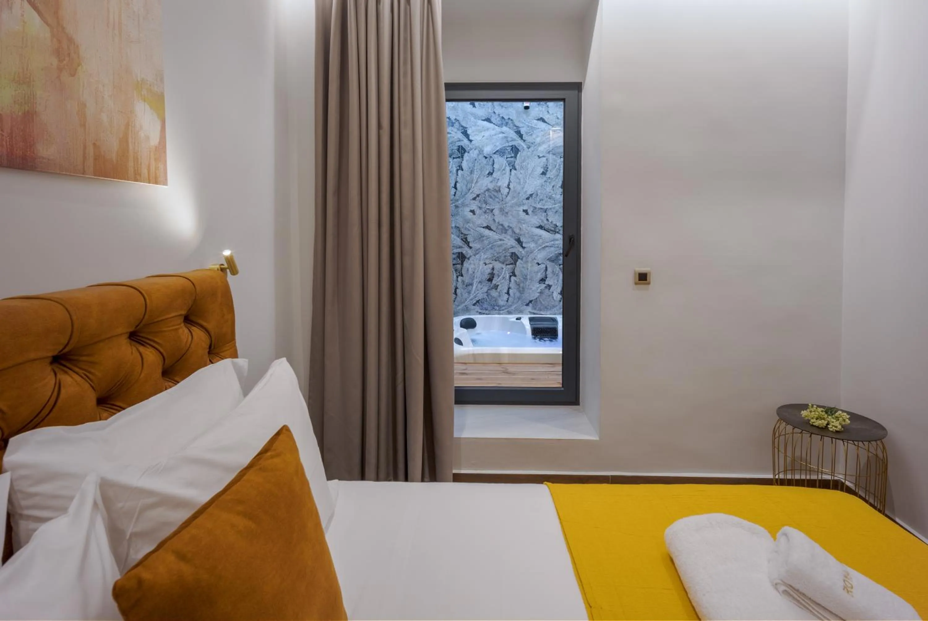 Bed in Royal Gold City Suites by Omilos Hotels