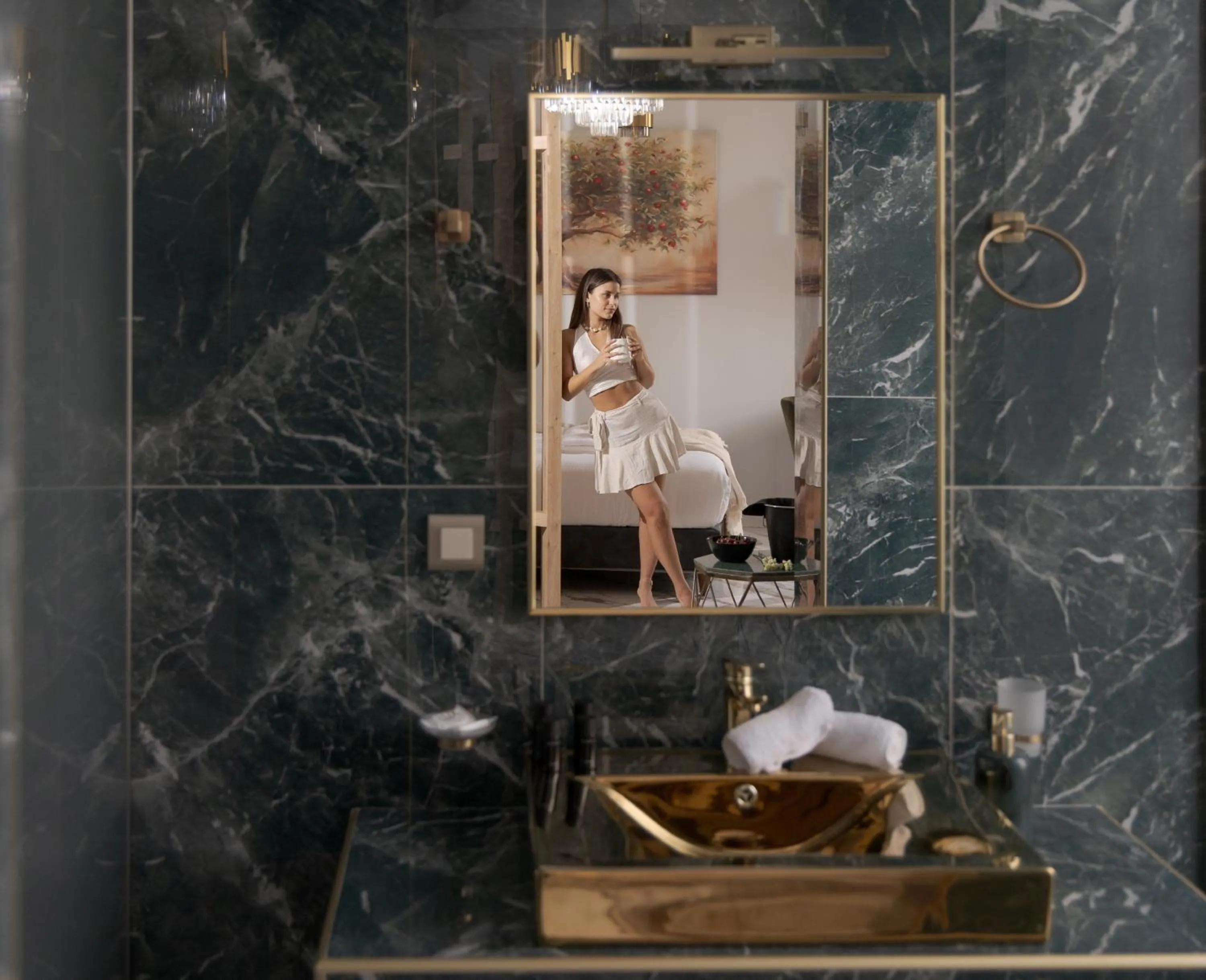 People in Royal Gold City Suites by Omilos Hotels