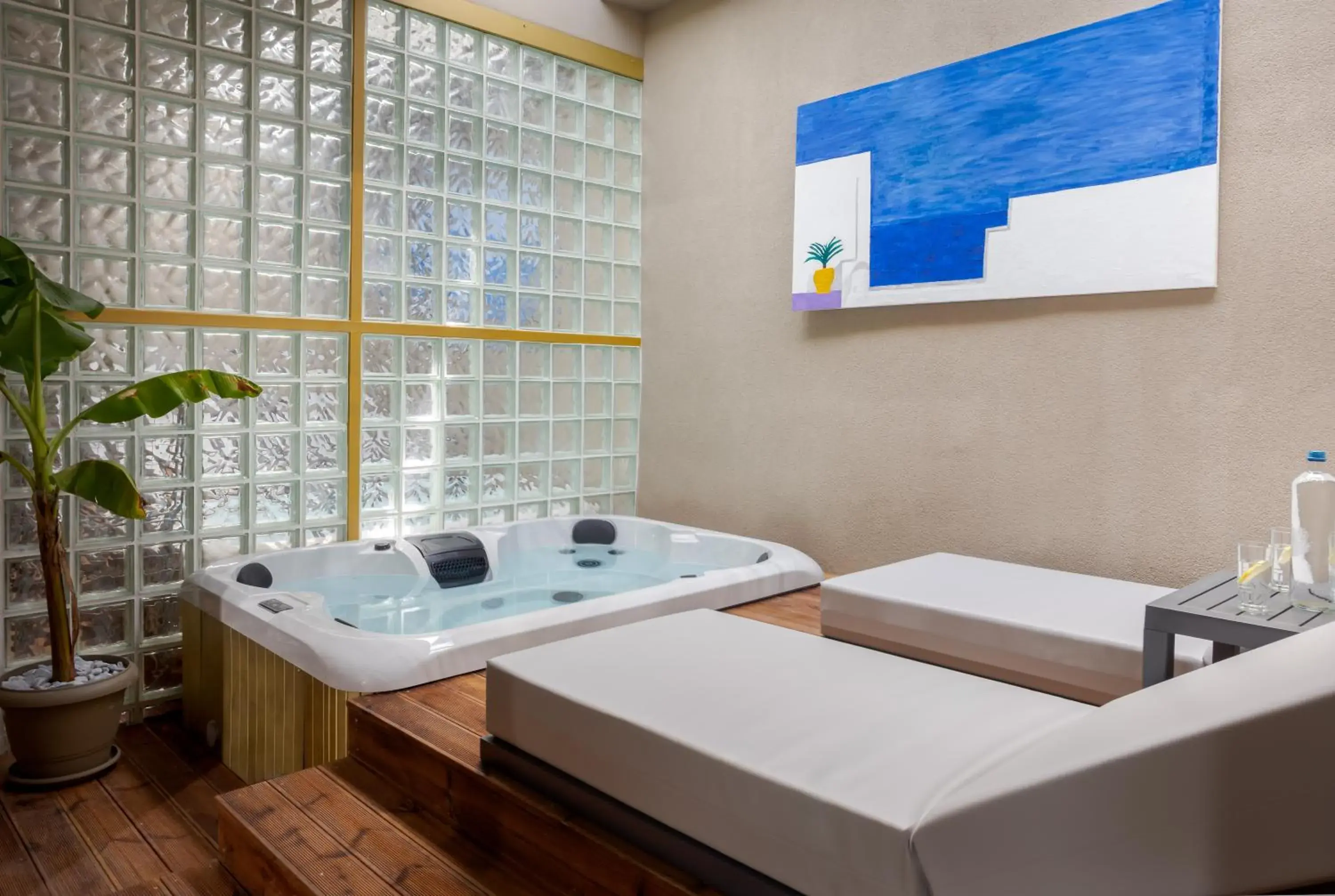 Hot Tub, Bed in Royal Gold City Suites by Omilos Hotels Hot Tub, Bed in Royal Gold City Suites by Omilos Hotels