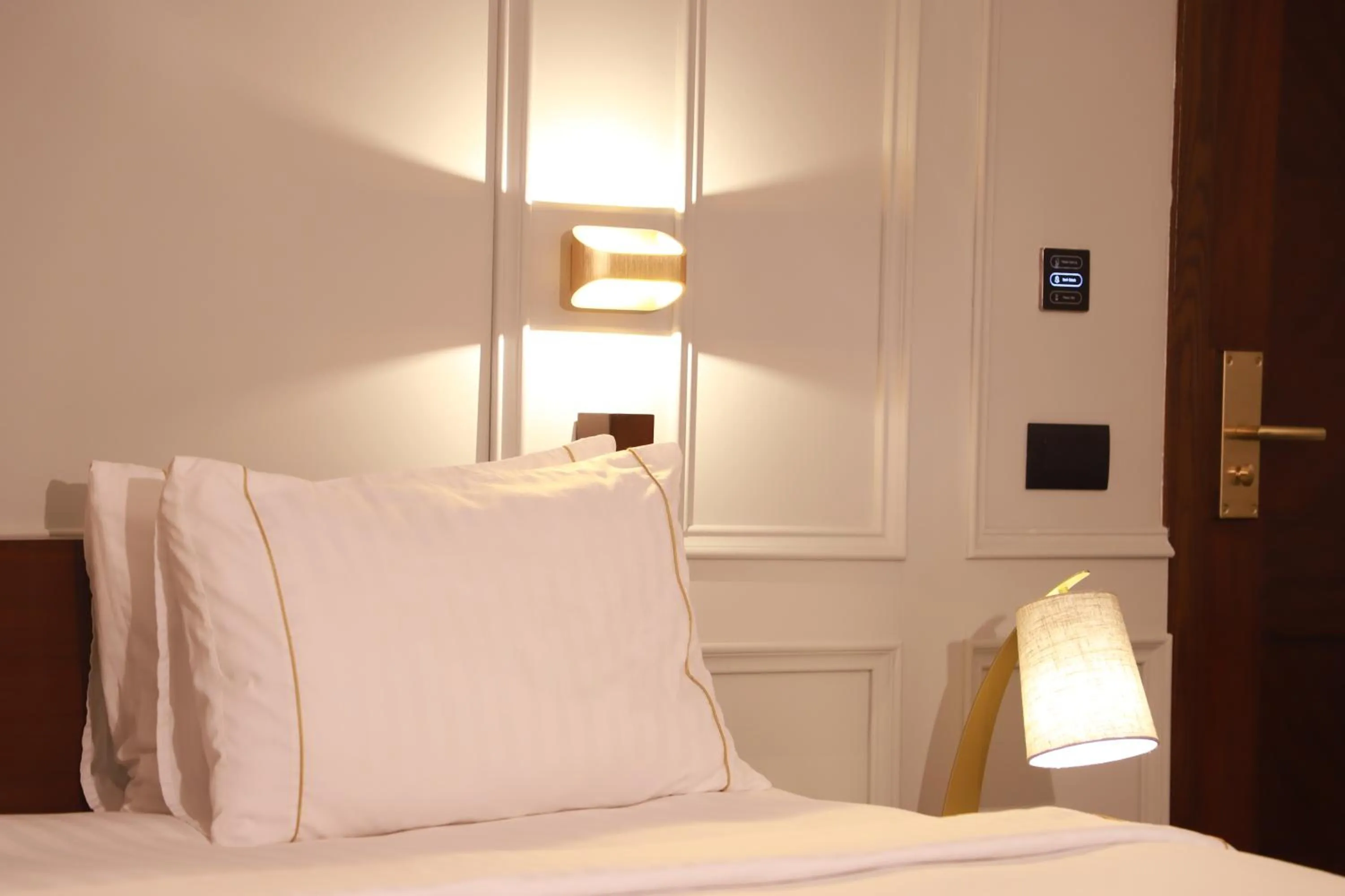 Bed in The Residency Hotel