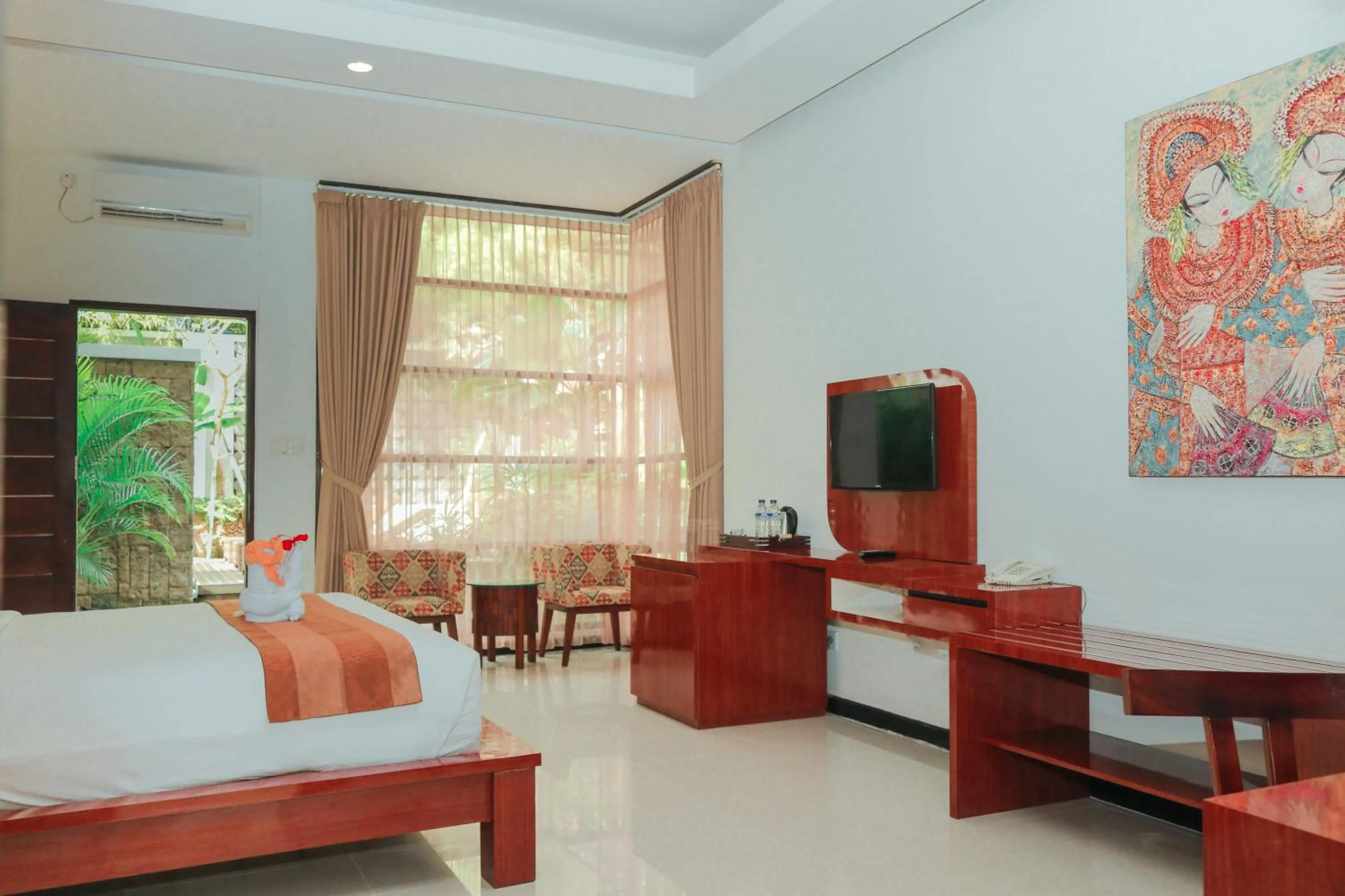 Seating area, Bed in Argya Santi Suite and Villas