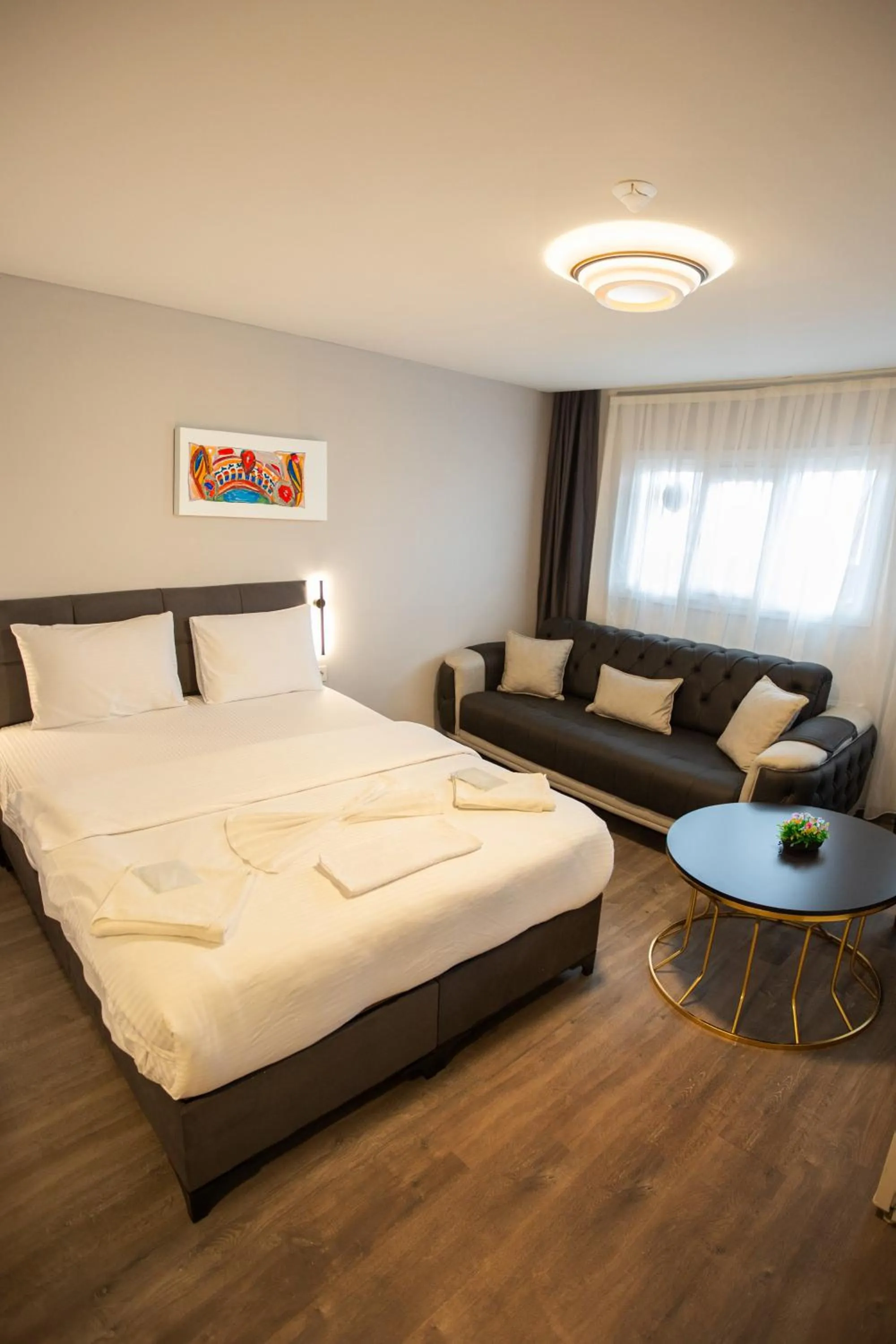 Bed in Liza Suit Hotel