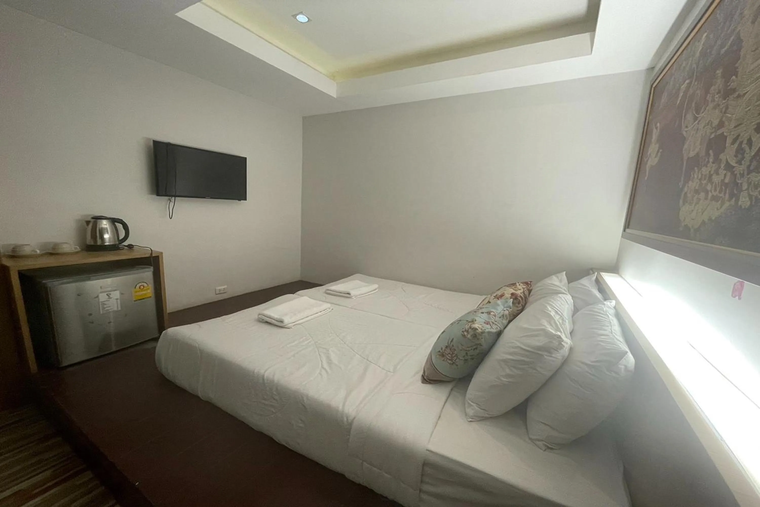 Bed in Landmark Patong Hotel