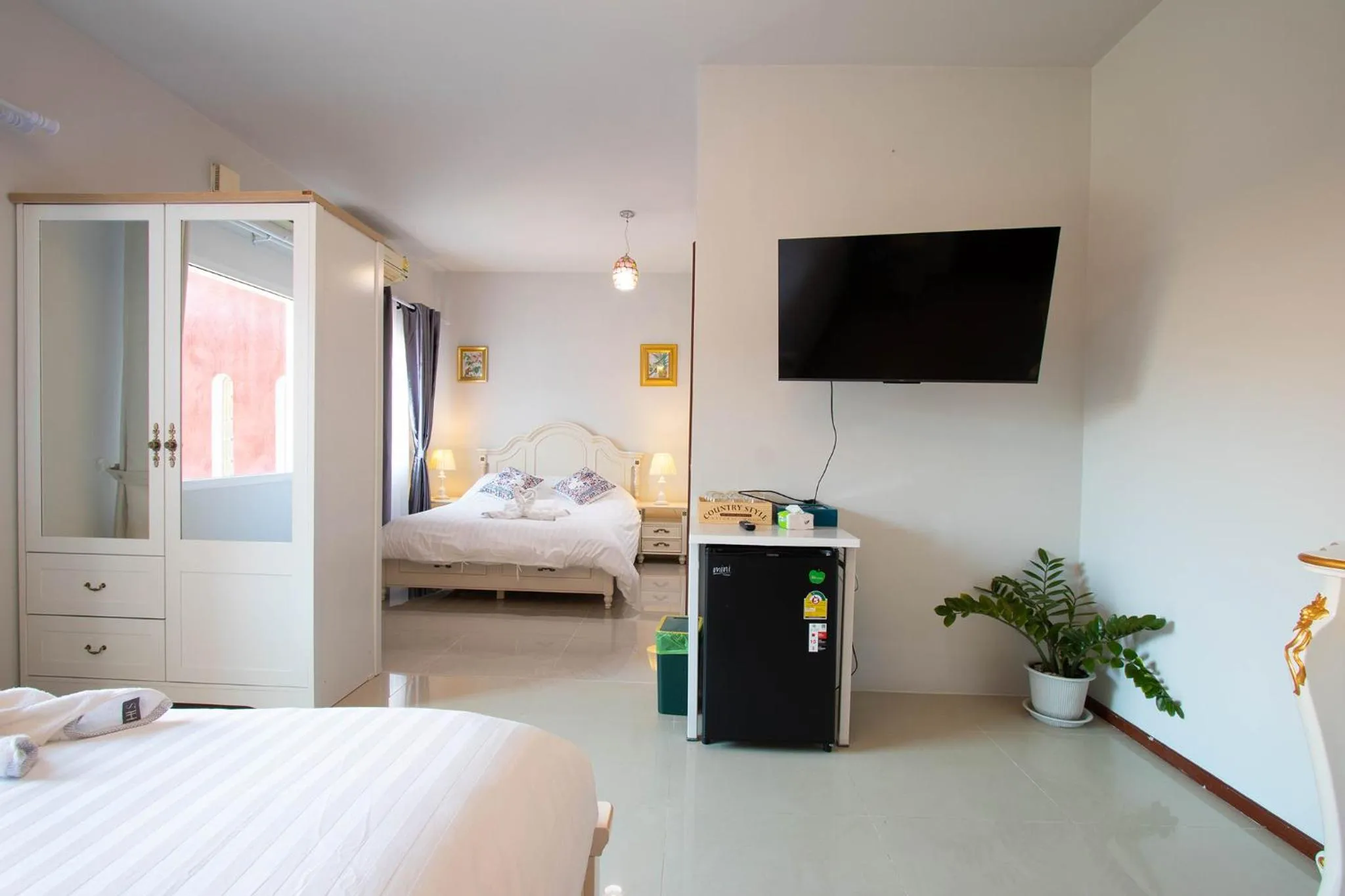 Photo of the whole room, Bed in Hacienda Resort - Mae Phim