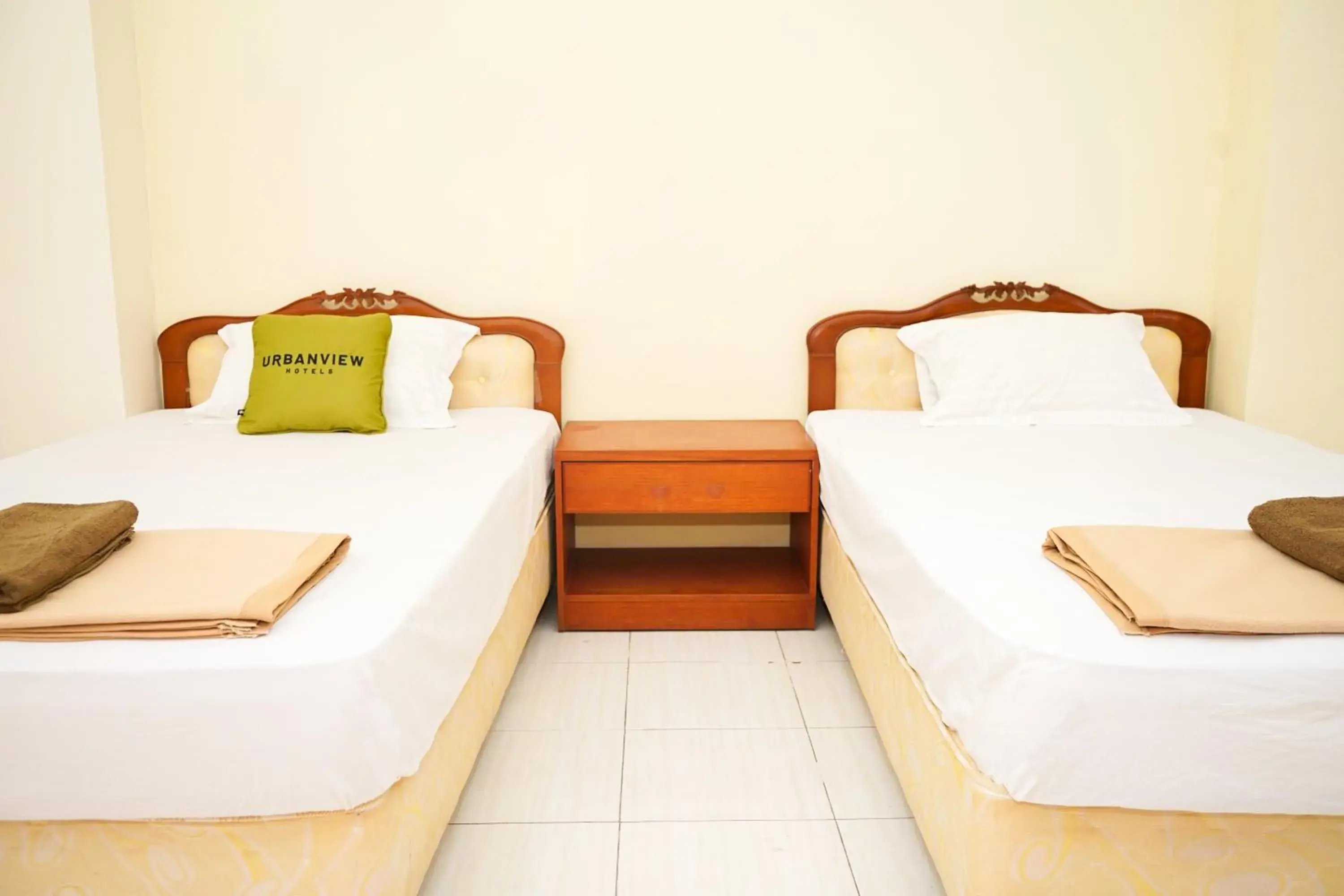 Superior Twin Room in Urbanview Hotel Ratu Elok Syariah Banjarbaru by RedDoorz Superior Twin Room in Urbanview Hotel Ratu Elok Syariah Banjarbaru by RedDoorz