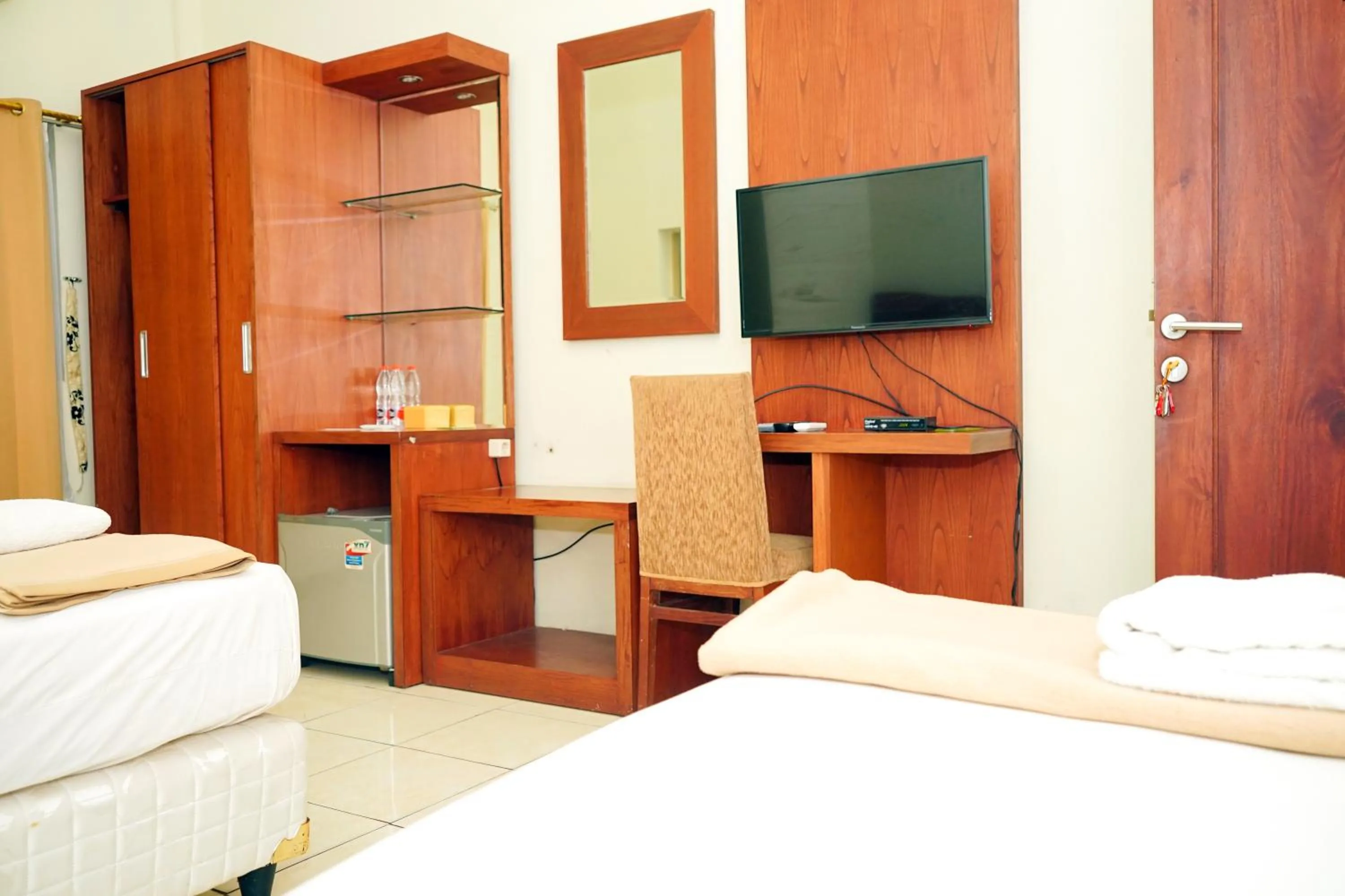 Bedroom, Bed in Urbanview Hotel Syariah Ratu Elok Banjarbaru by RedDoorz