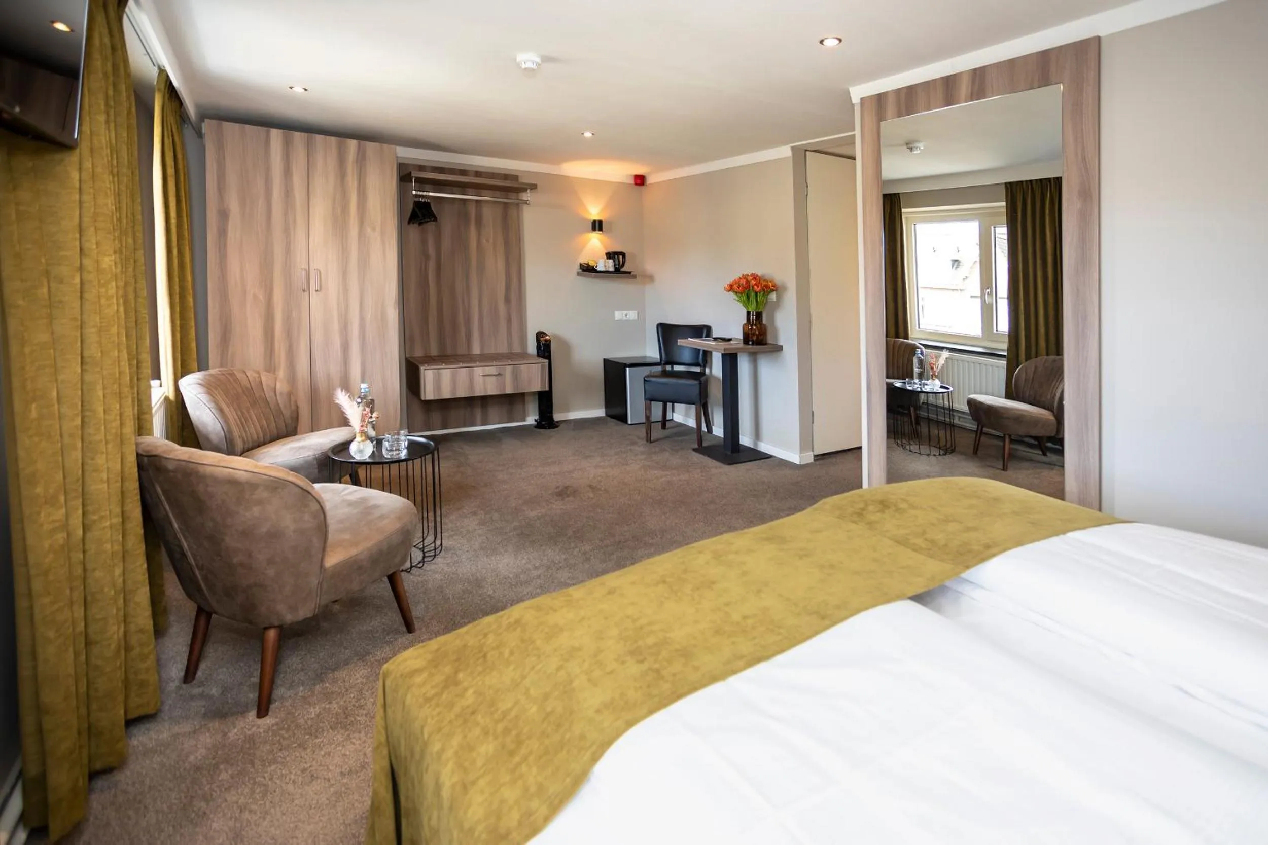 Seating area, Bed in Hotel Botterweck