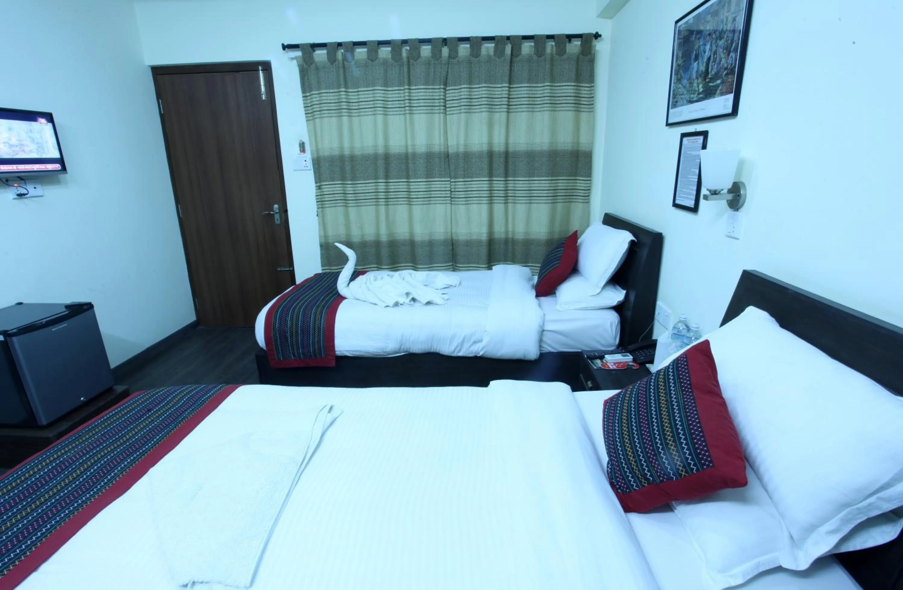 Bedroom in Alpine Hotel & Apartment