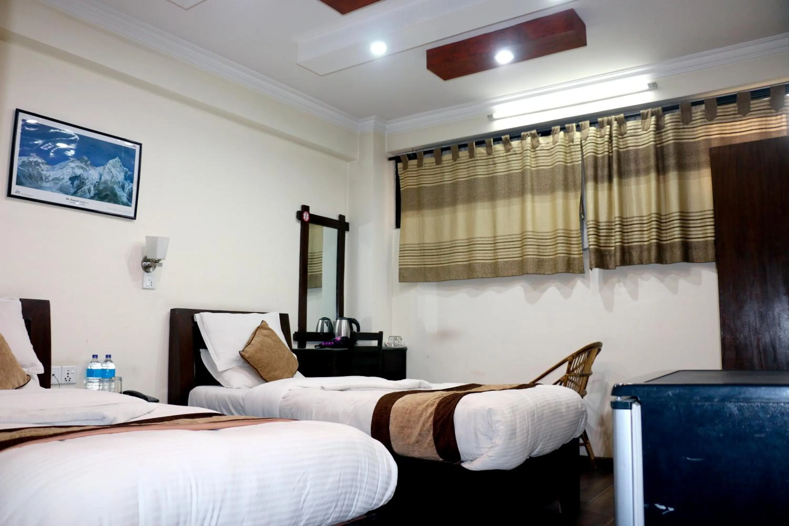 Bedroom in Alpine Hotel & Apartment