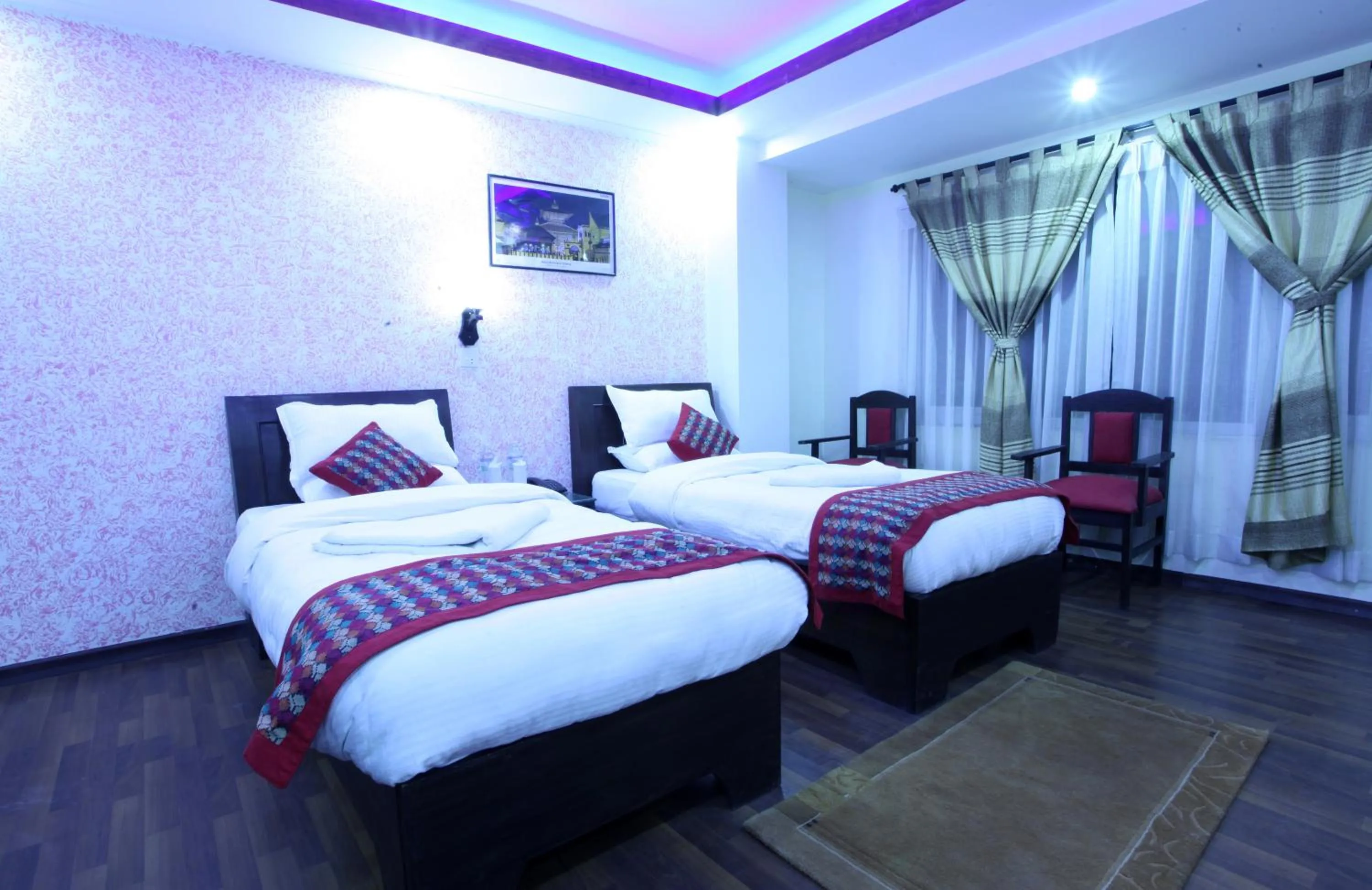 Bed in Alpine Hotel & Apartment