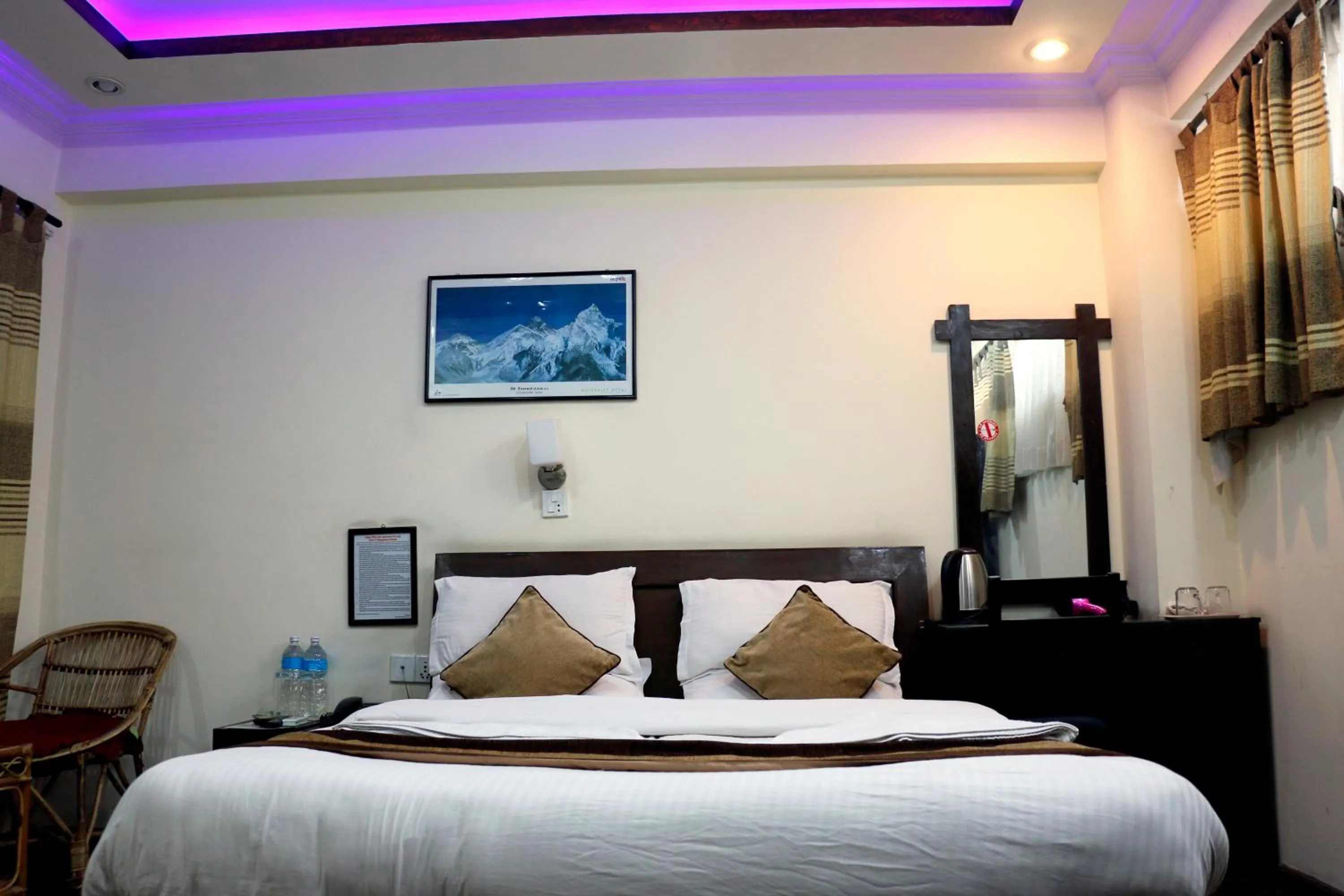 Bedroom in Alpine Hotel & Apartment