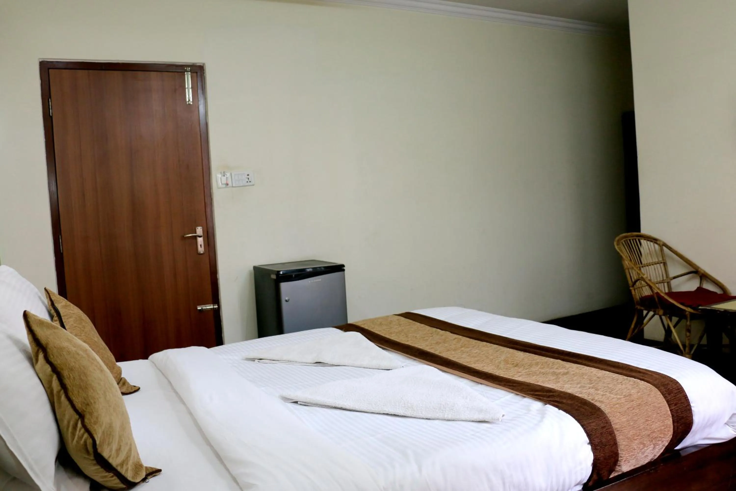 Bedroom in Alpine Hotel & Apartment