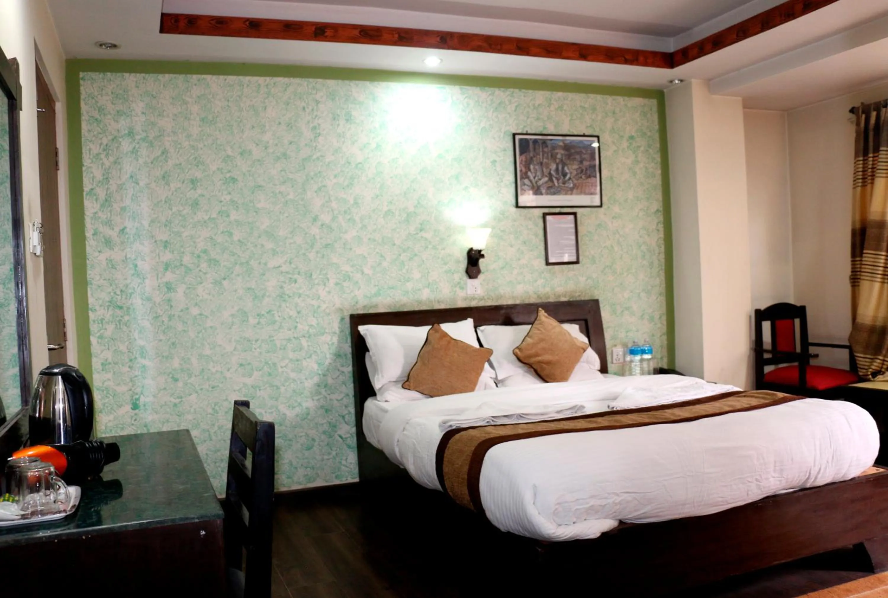 Bedroom in Alpine Hotel & Apartment