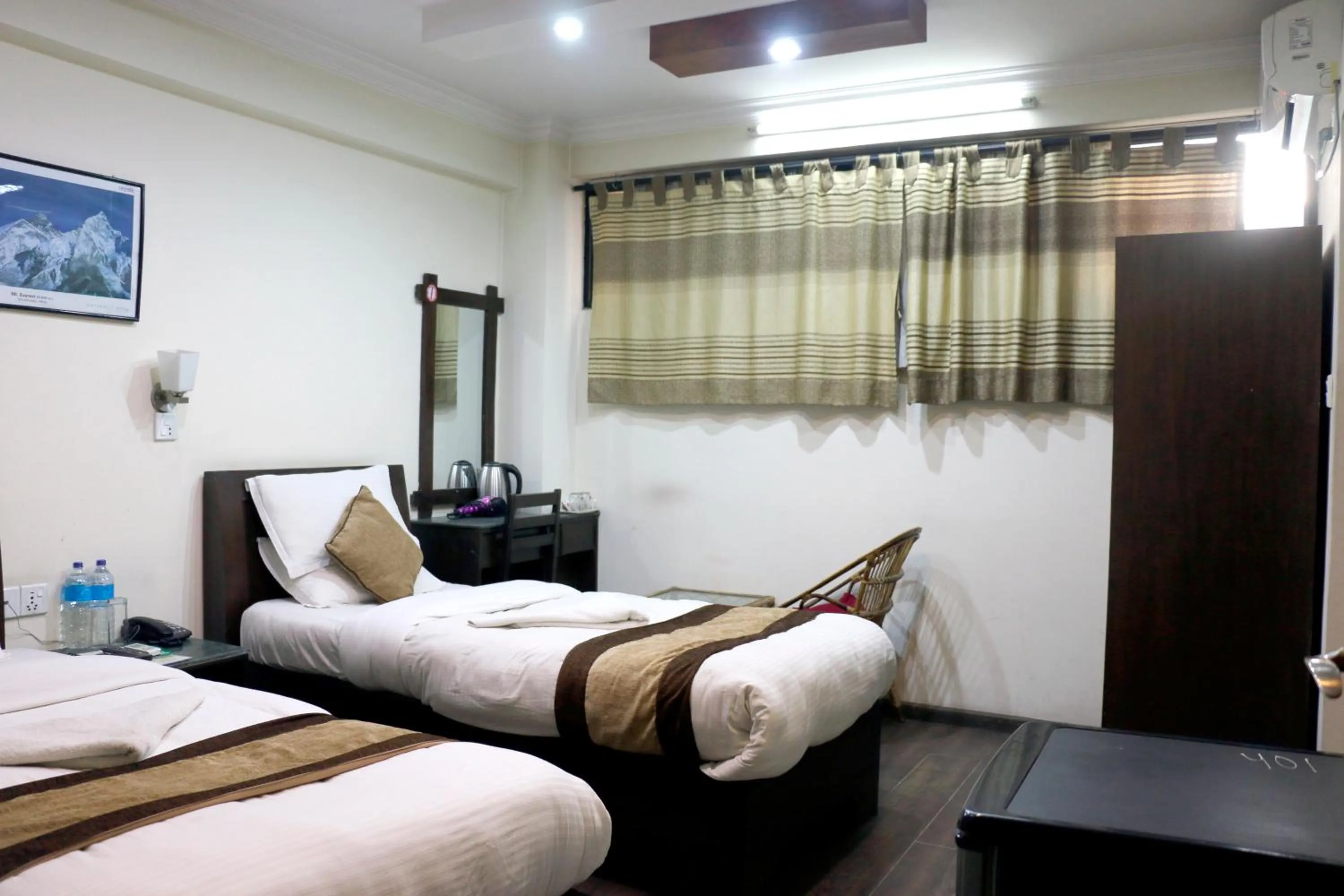 Bedroom in Alpine Hotel & Apartment