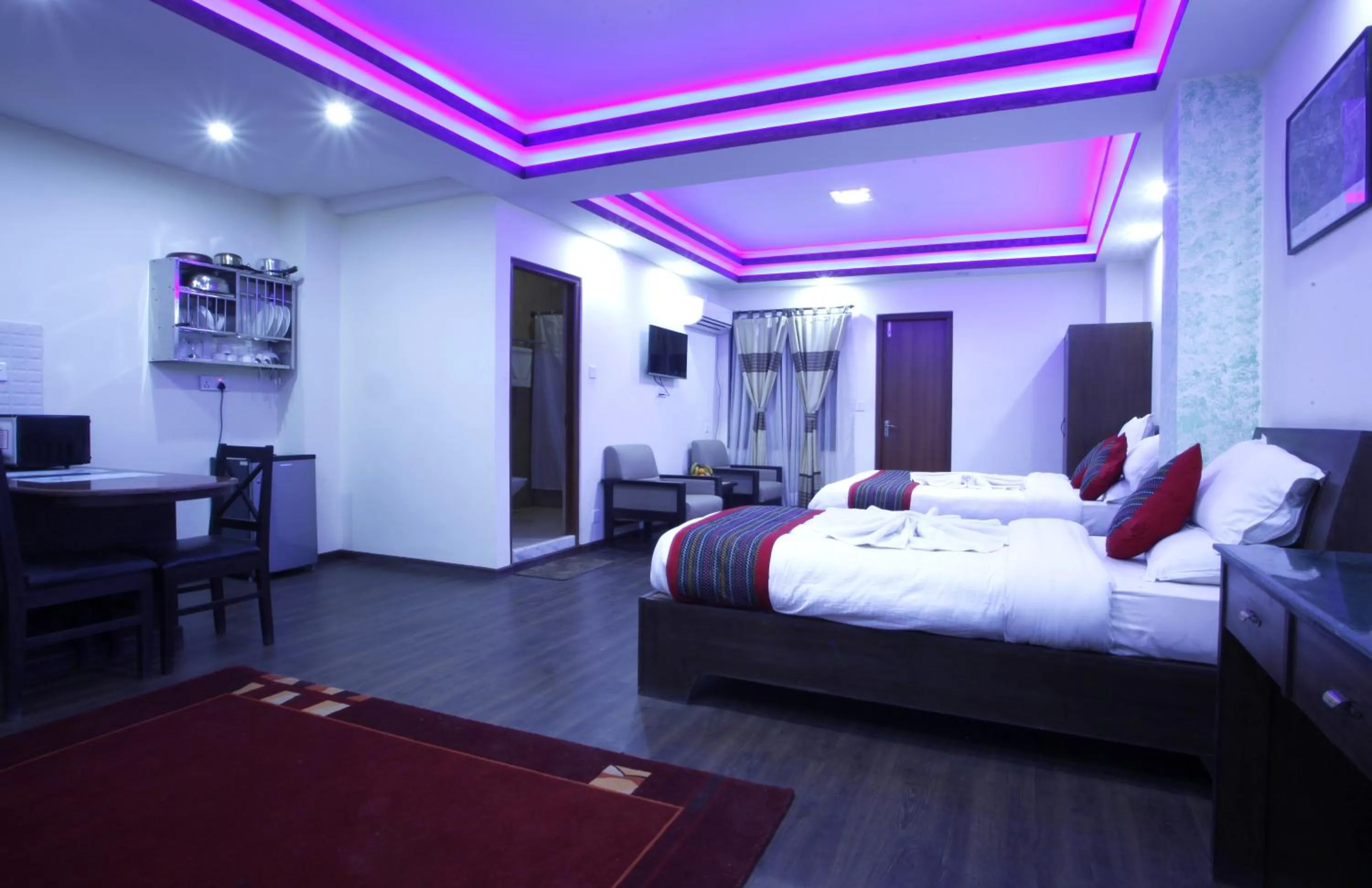 Bed in Alpine Hotel & Apartment