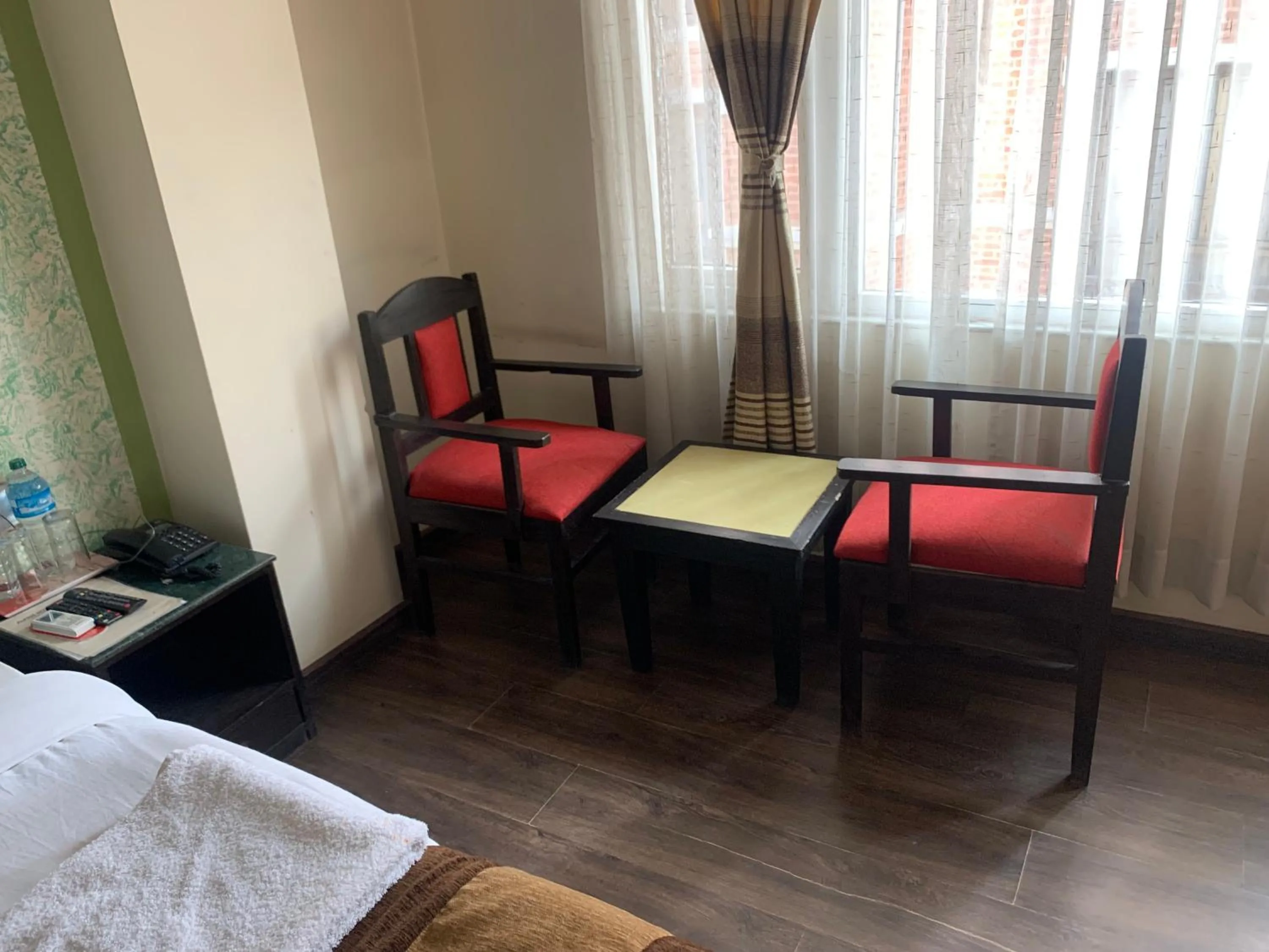 Seating area in Alpine Hotel & Apartment