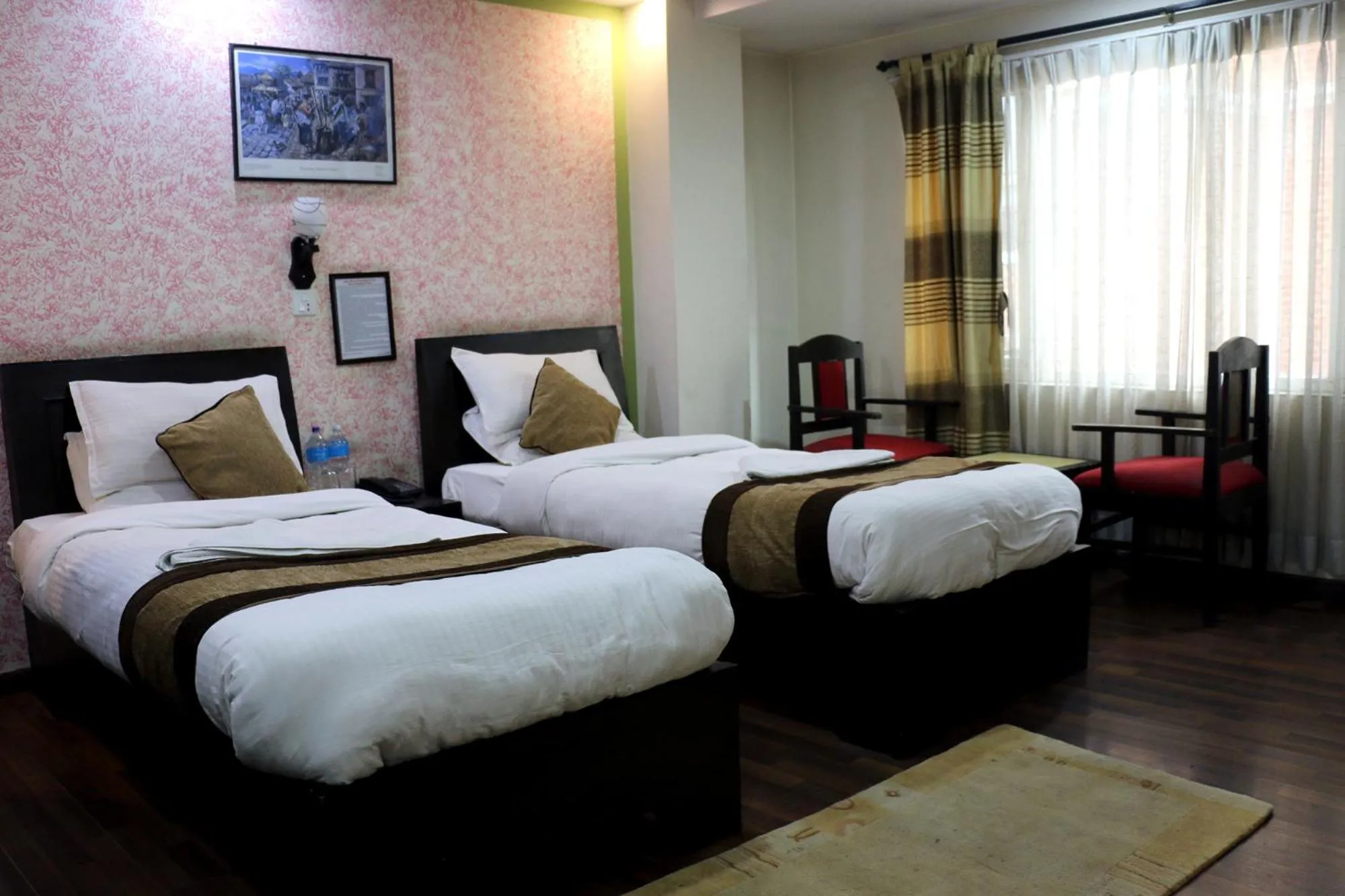 Bedroom in Alpine Hotel & Apartment