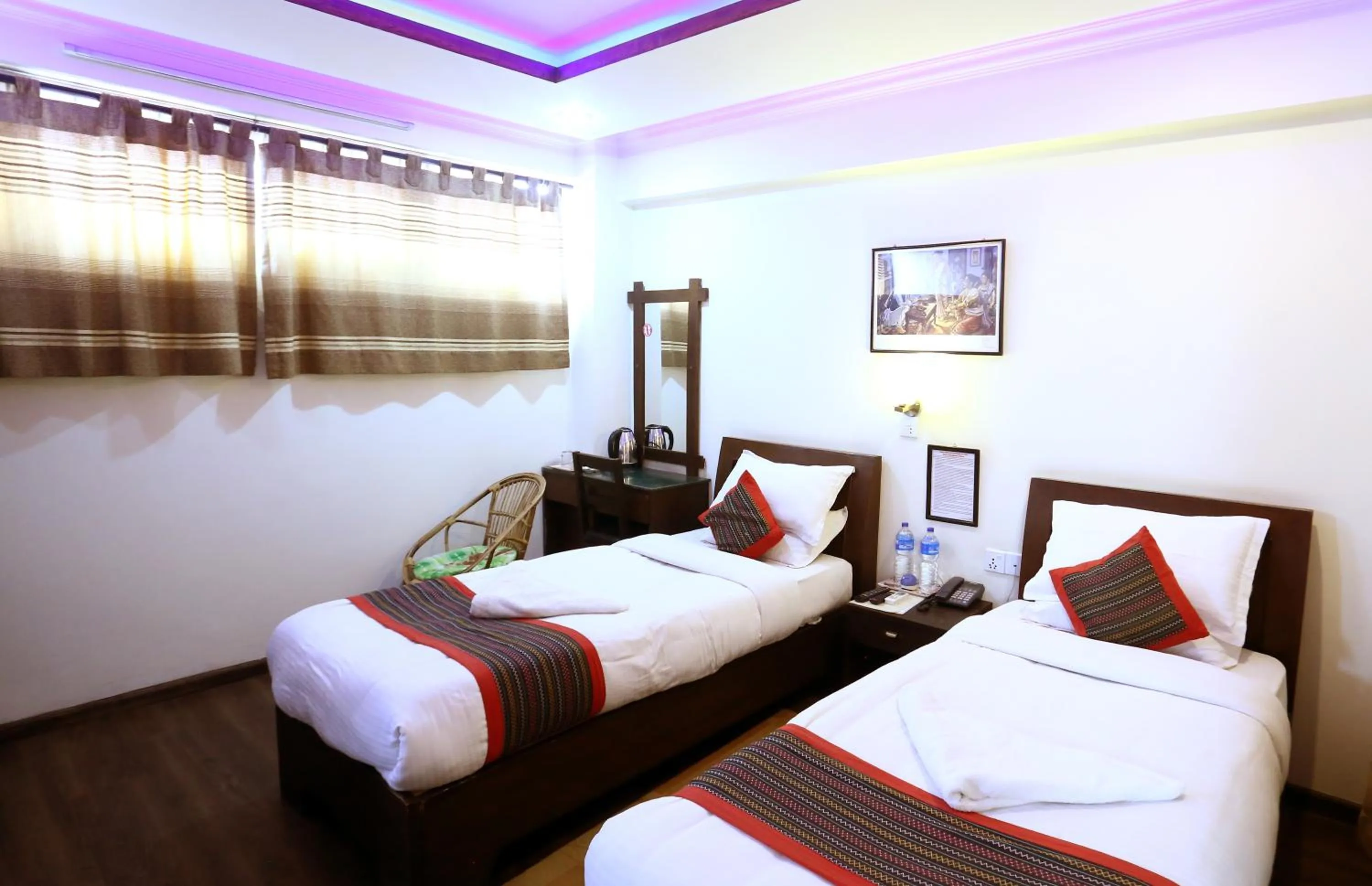 Bedroom in Alpine Hotel & Apartment