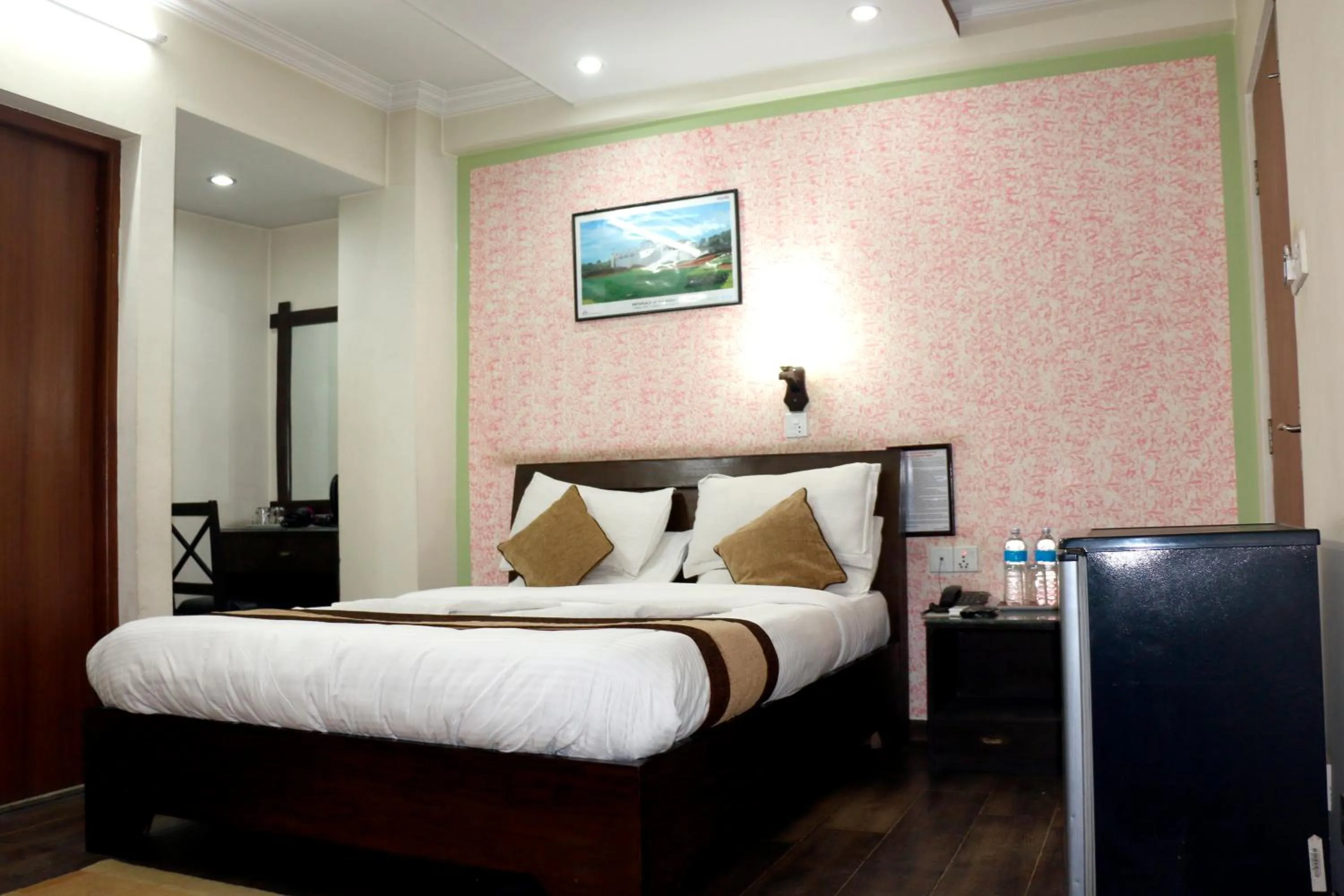 Bedroom in Alpine Hotel & Apartment