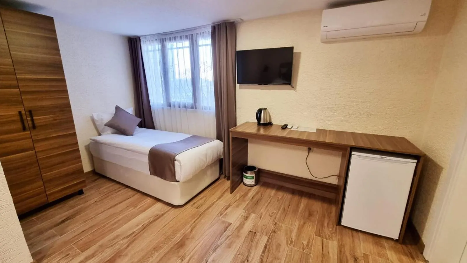 Bed in La Pearl Konaklama