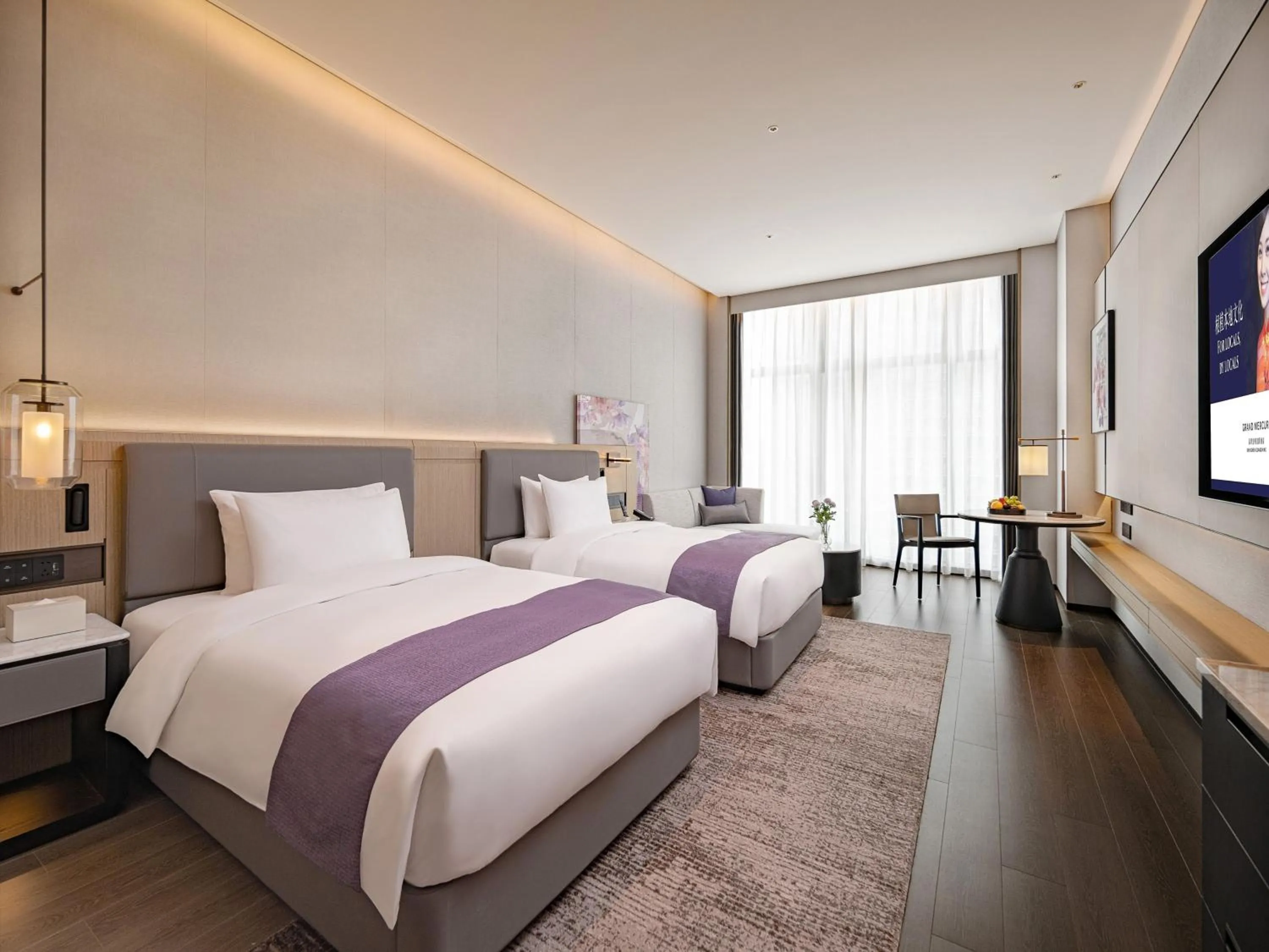 Bed in Grand Mercure Shenzhen Guangming