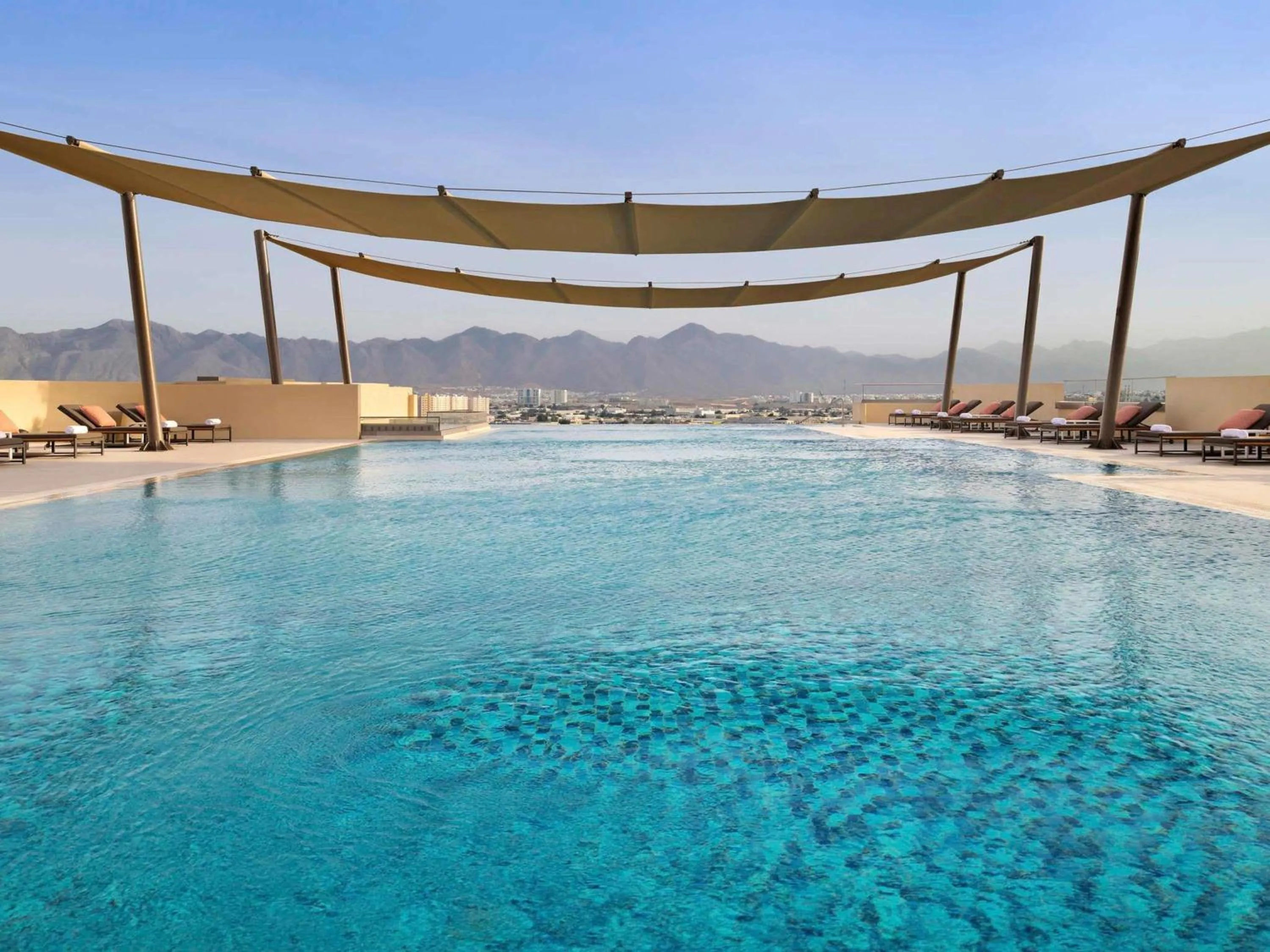 Pool view in Mövenpick Hotel & Apartments Ghala Muscat