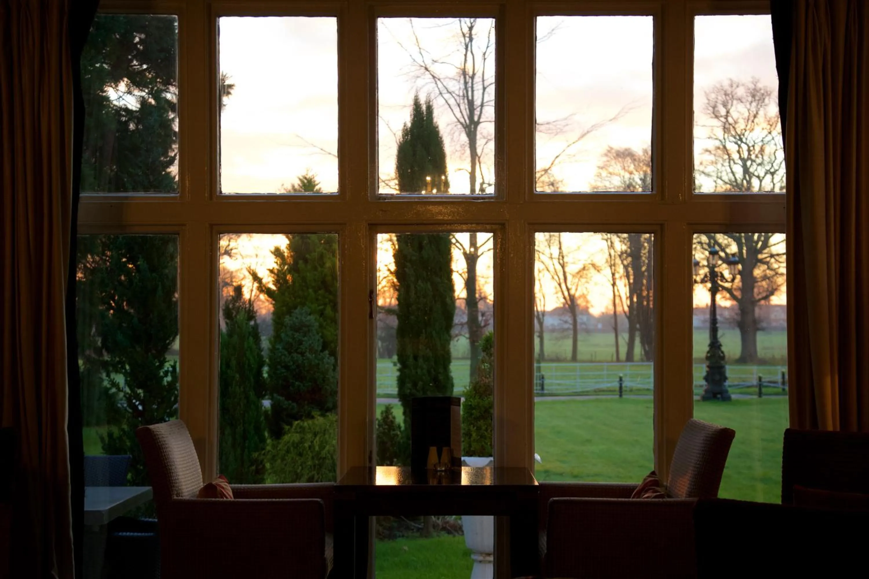 Dining area in Wrexham Llyndir Hotel by Belvilla