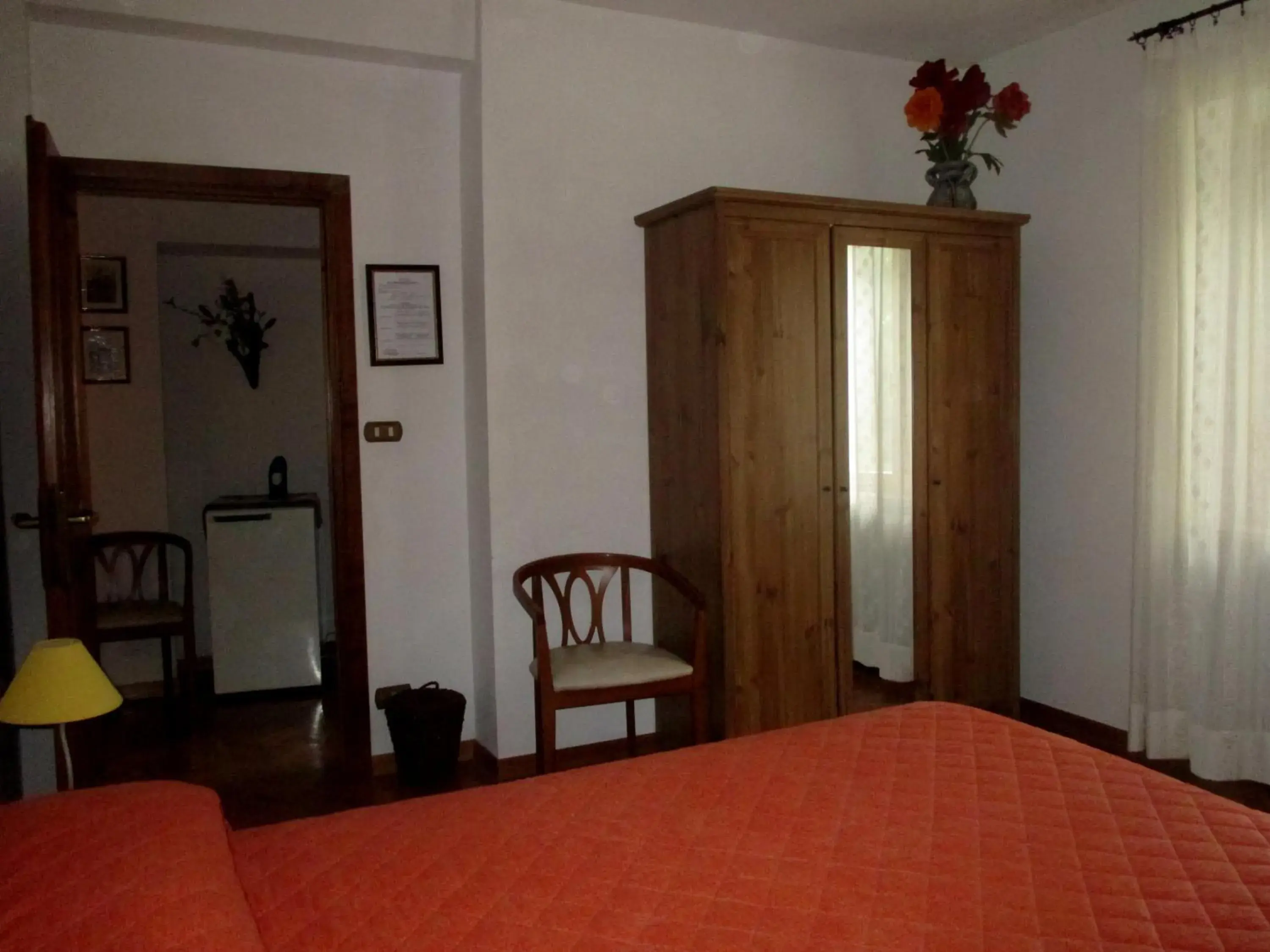Basic Triple Room with Shared Bathroom in Affittacamere DaMammaSara Basic Triple Room with Shared Bathroom in Affittacamere DaMammaSara