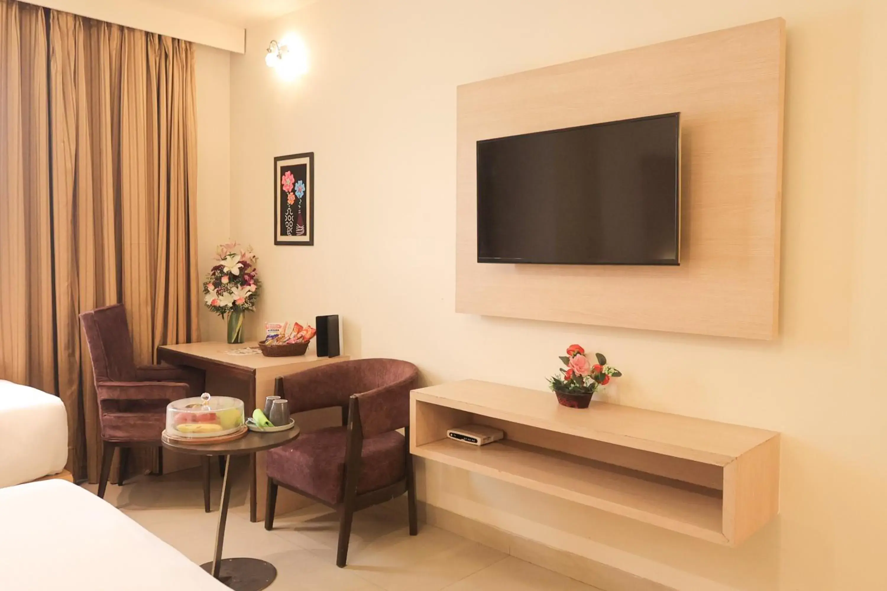 Communal lounge/ TV room in Ecko Lite MARS Hotel, Amritsar Communal lounge/ TV room in Ecko Lite MARS Hotel, Amritsar