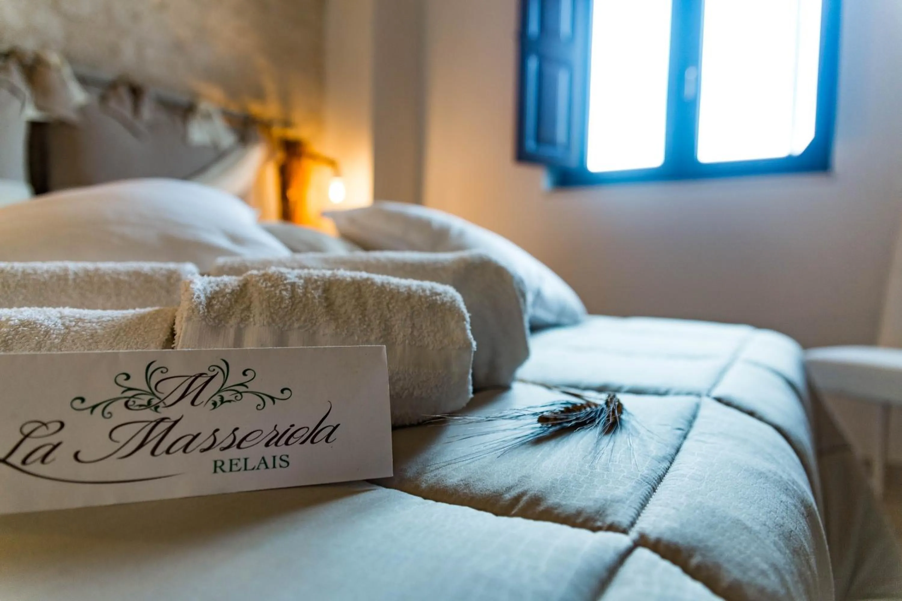 Bed in Relais La Masseriola