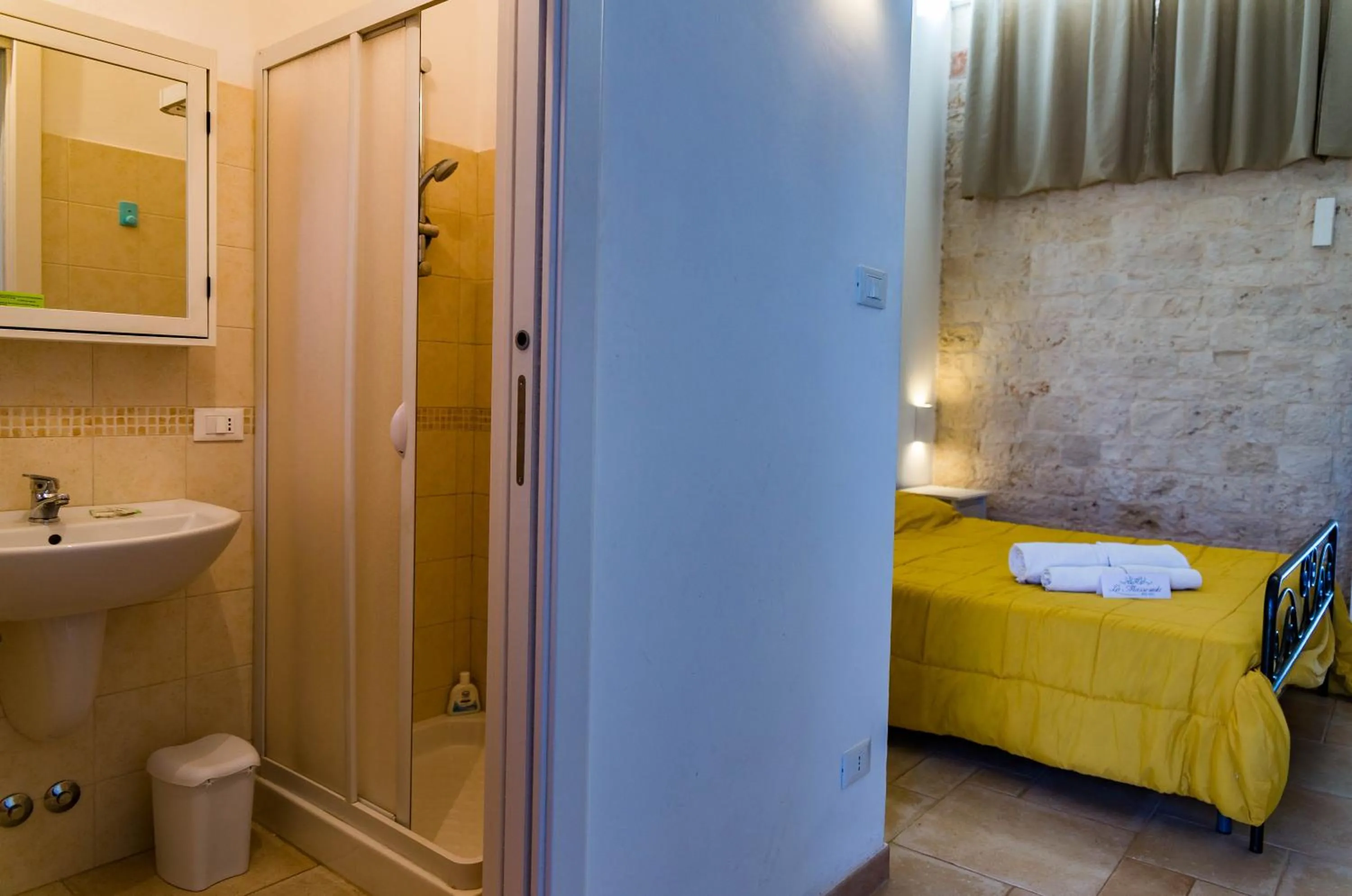 Bed in Relais La Masseriola
