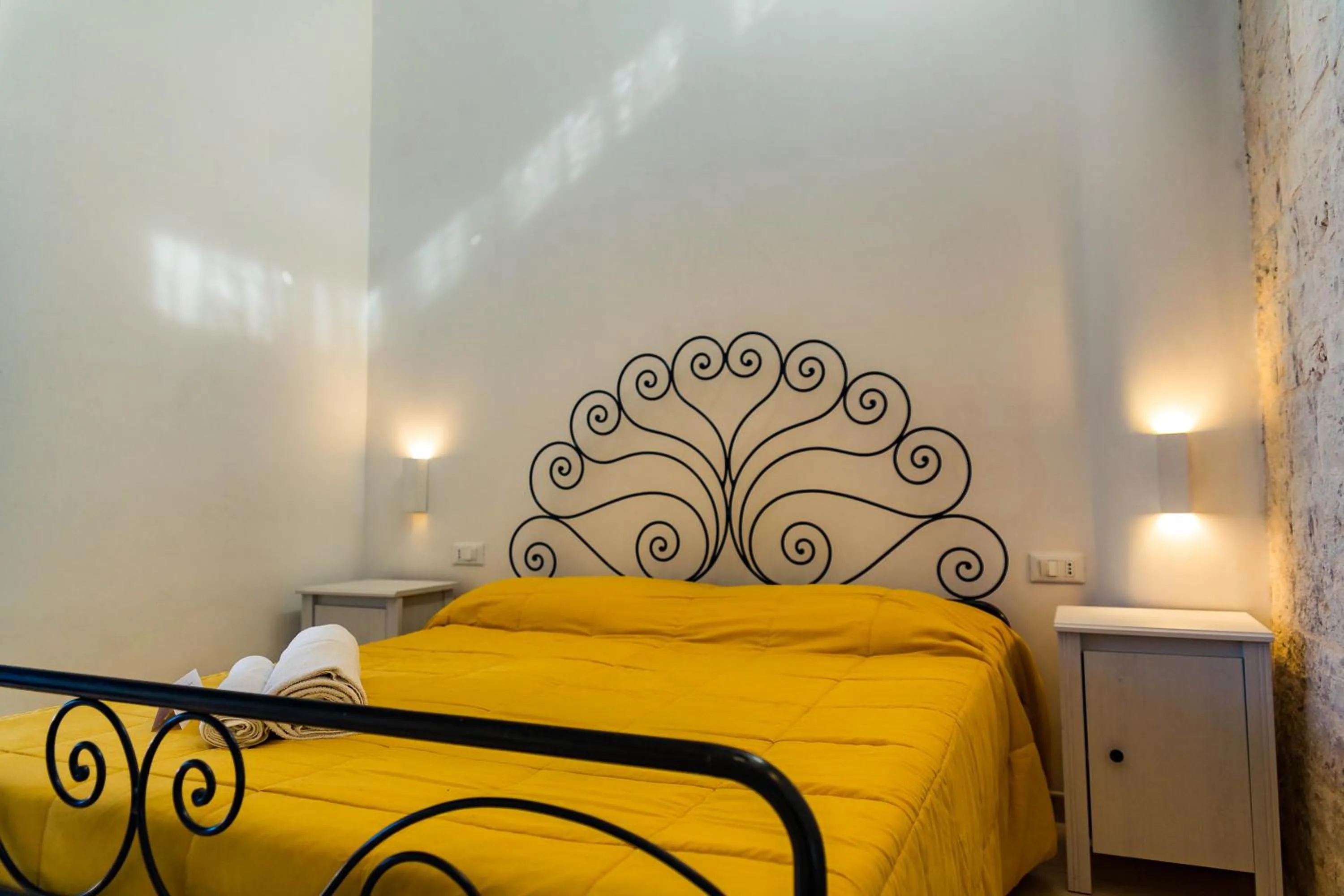 Bed in Relais La Masseriola