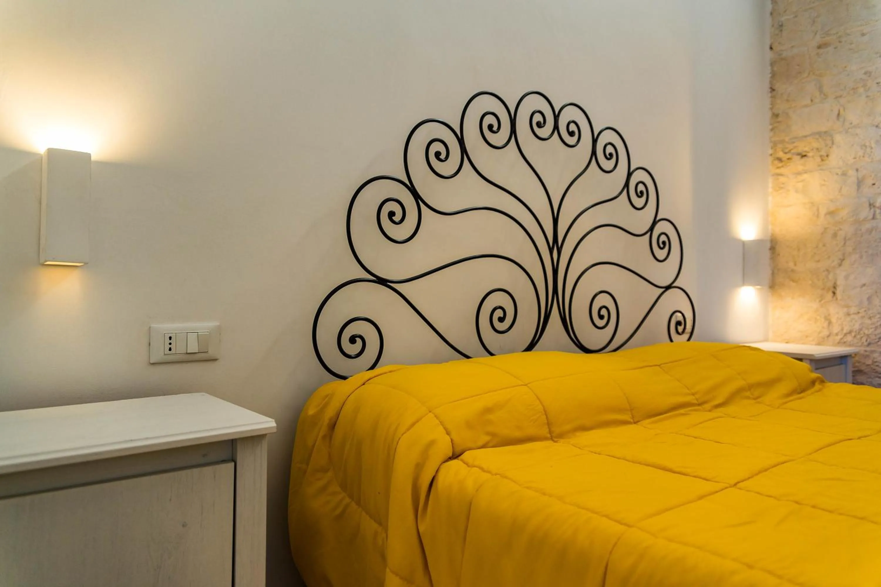 Bed in Relais La Masseriola