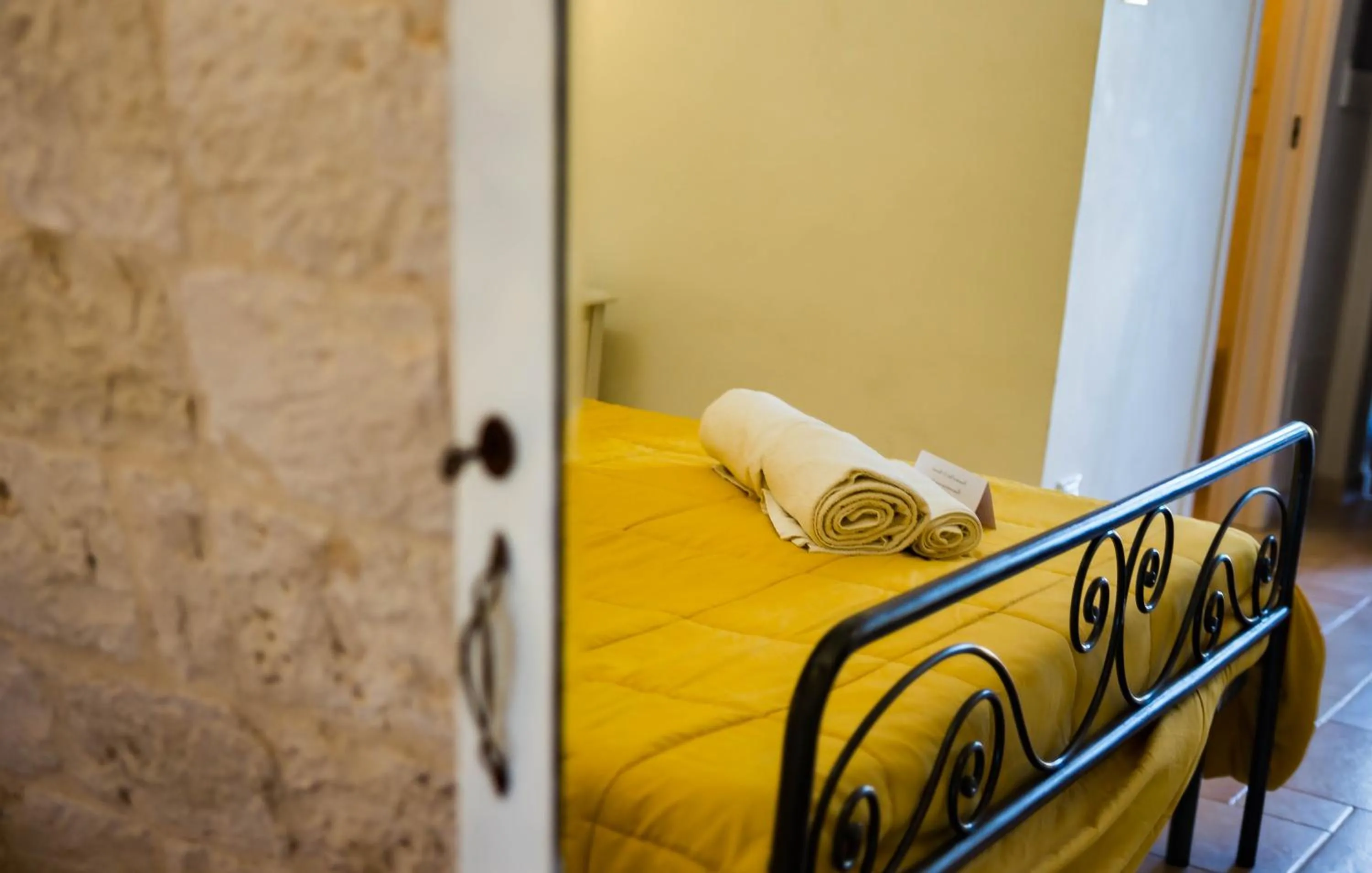 Decorative detail, Bed in Relais La Masseriola