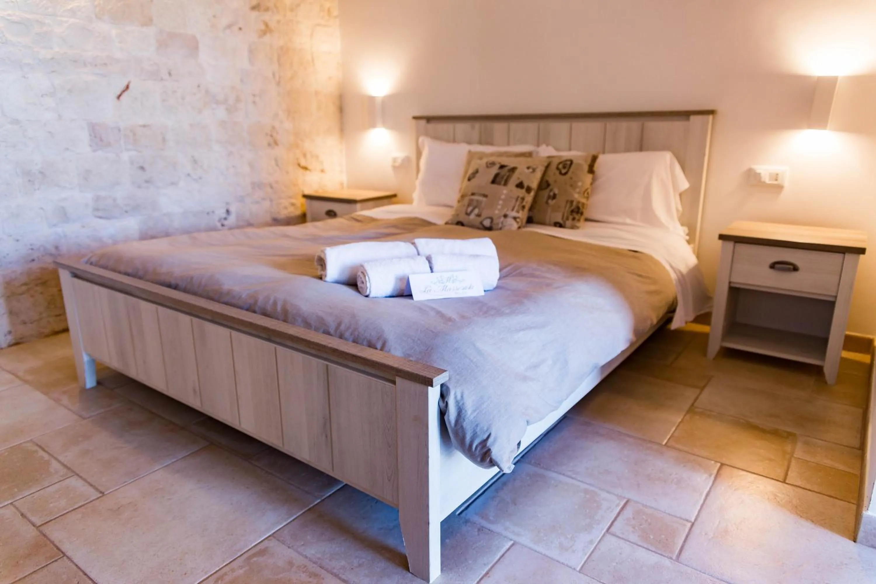 Bed in Relais La Masseriola