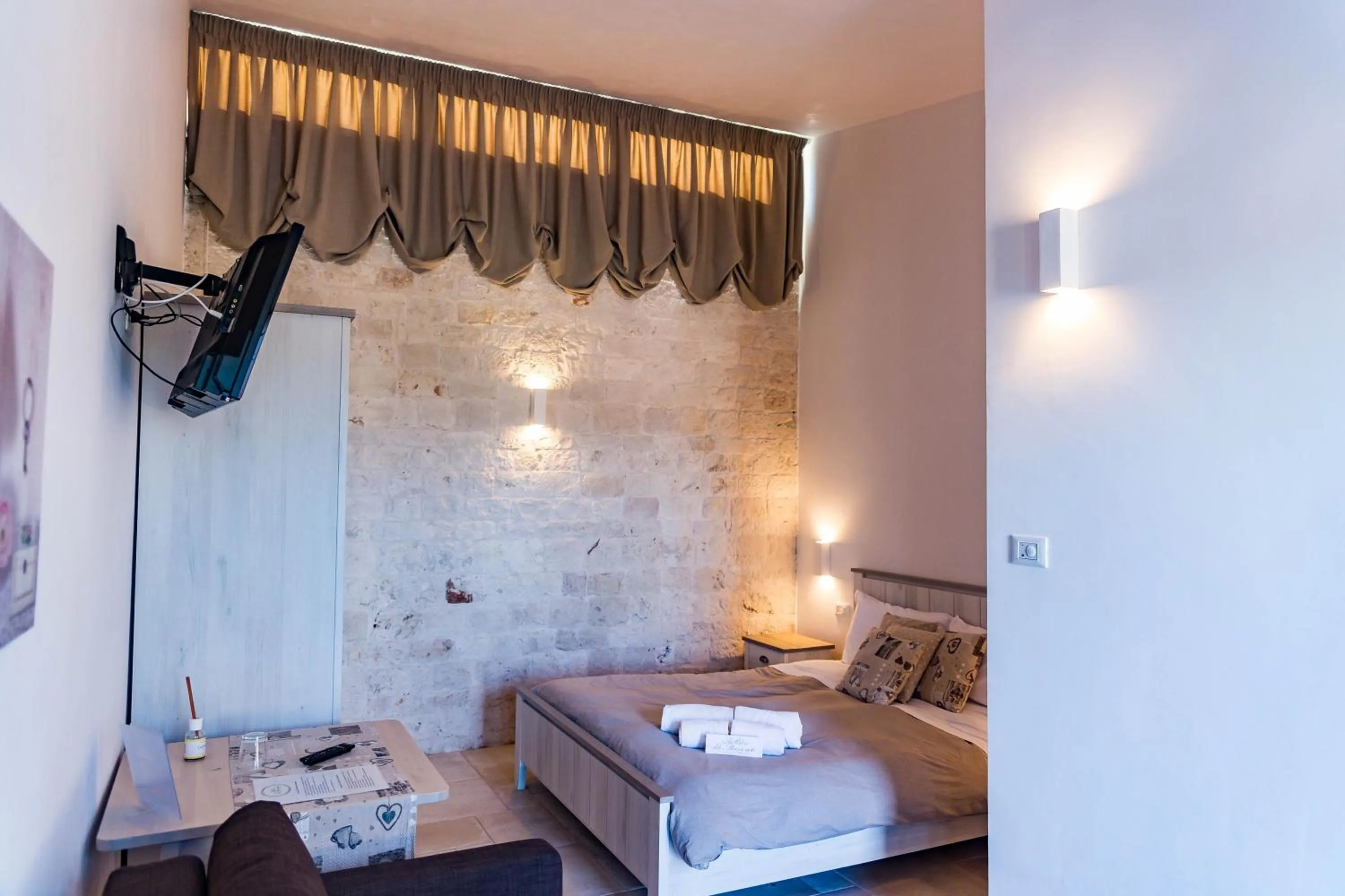Bed in Relais La Masseriola