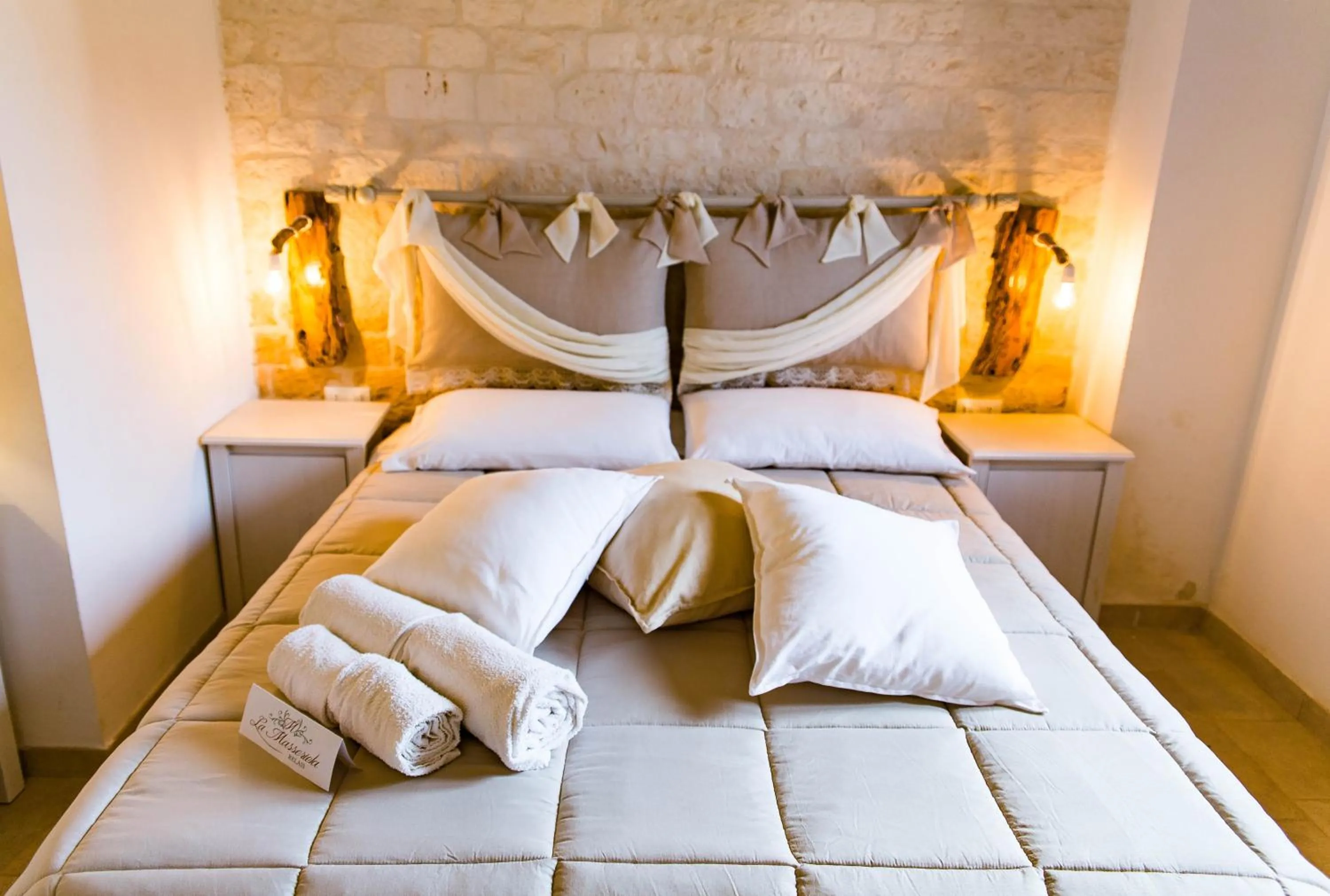 Bed in Relais La Masseriola