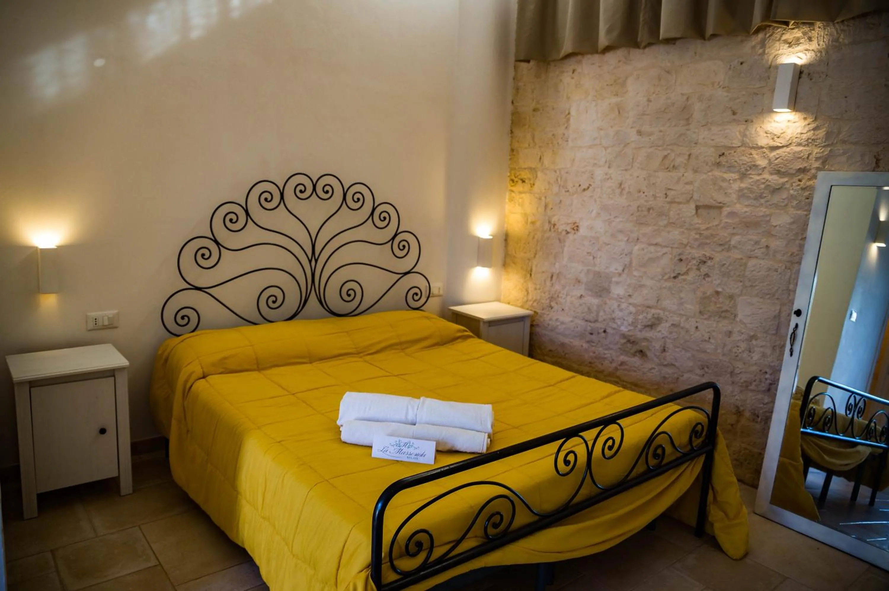 Bed in Relais La Masseriola