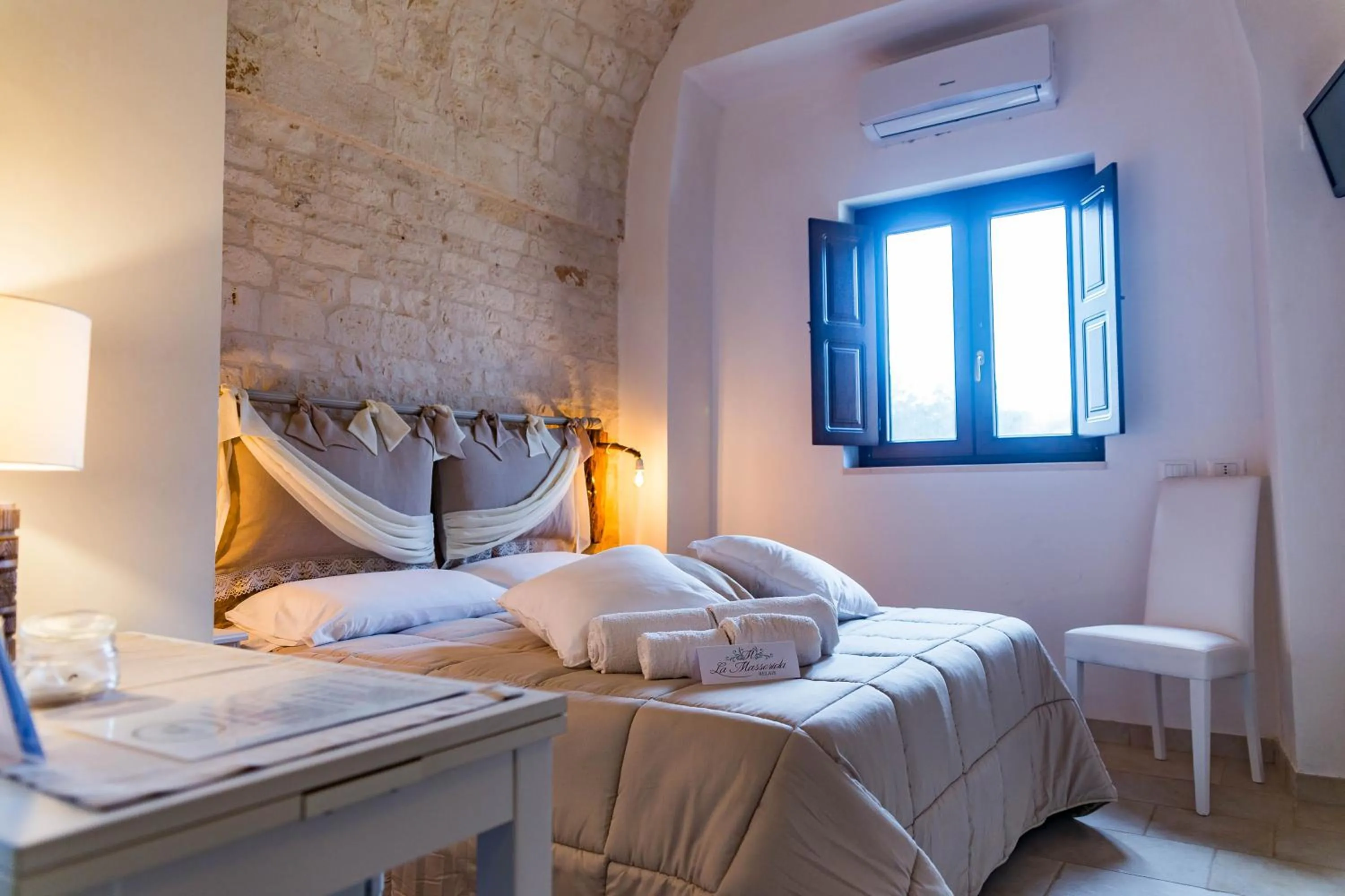 Bed in Relais La Masseriola