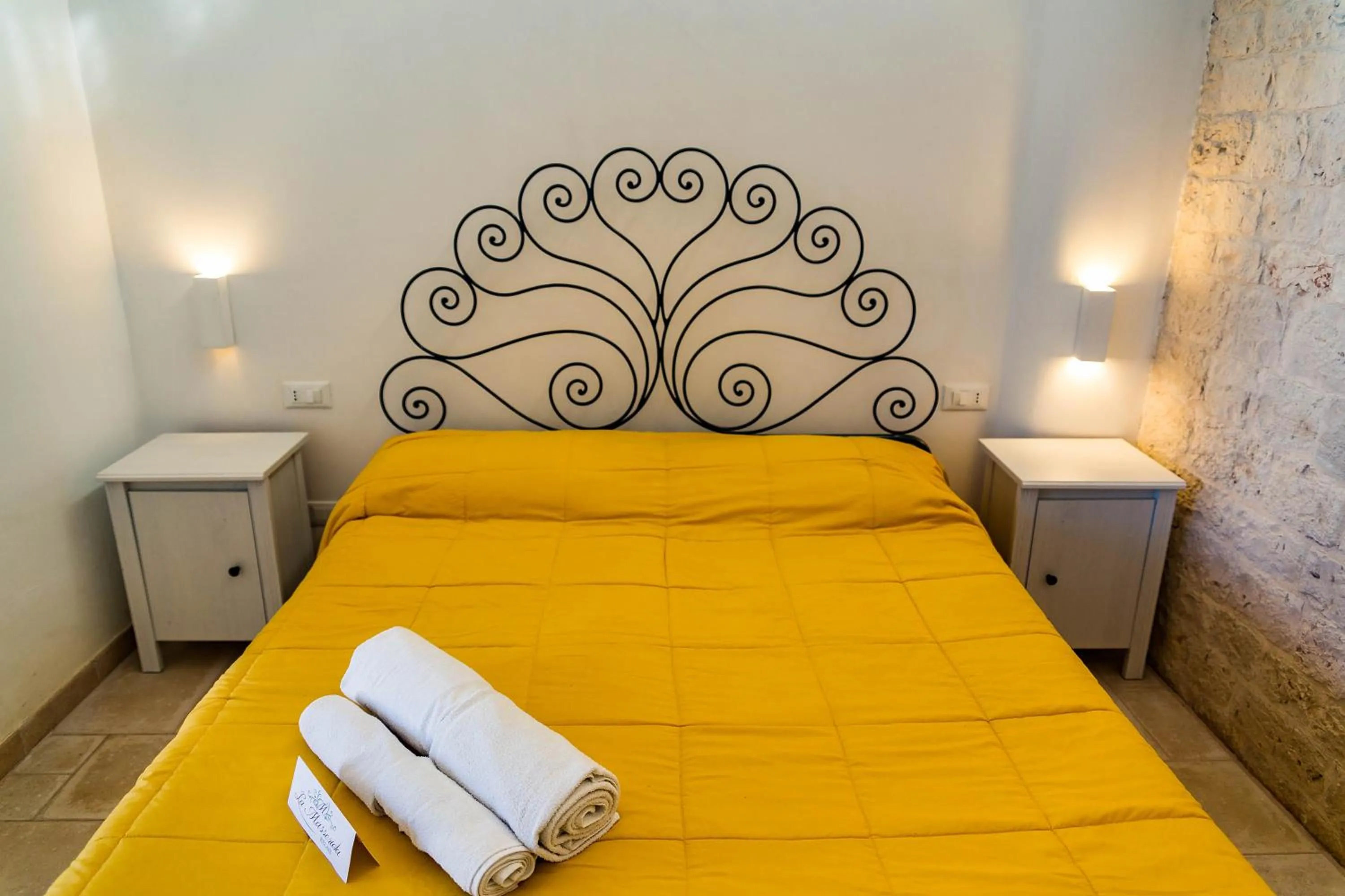 Bed in Relais La Masseriola