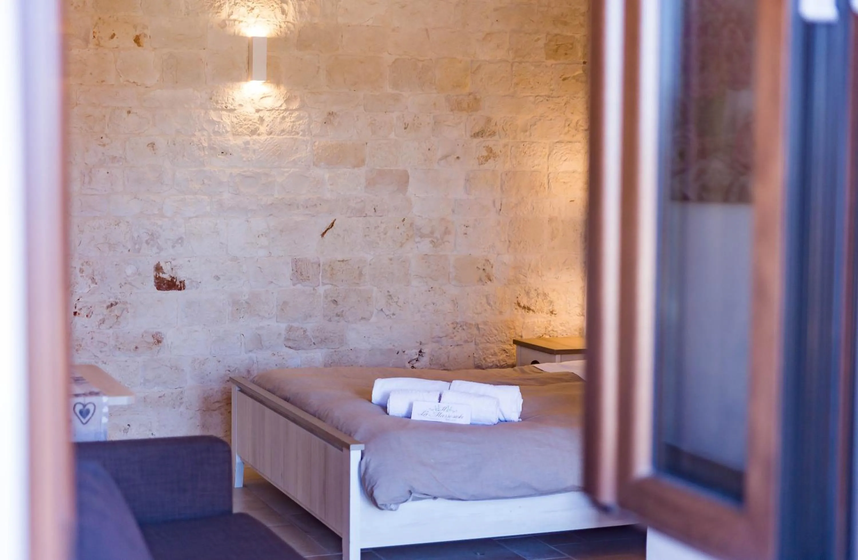 Bed in Relais La Masseriola