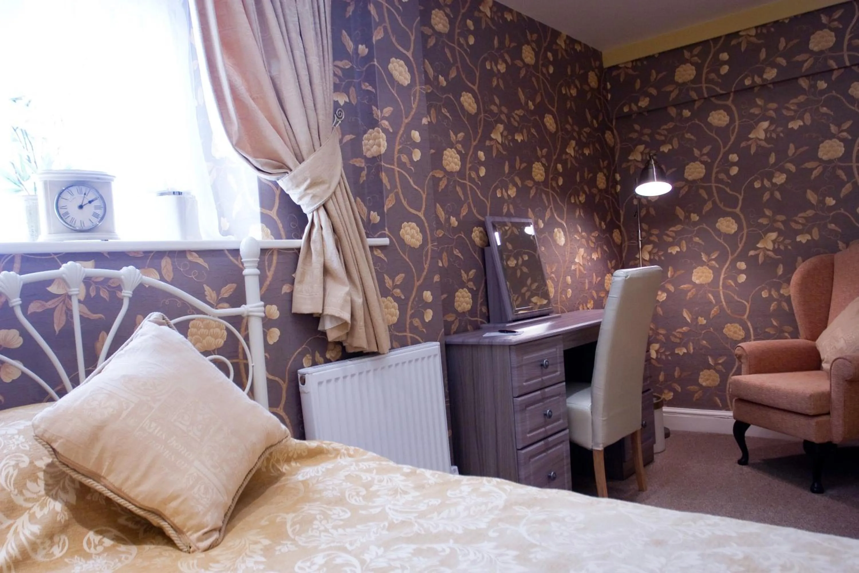 Decorative detail, Bed in Cotford Hotel