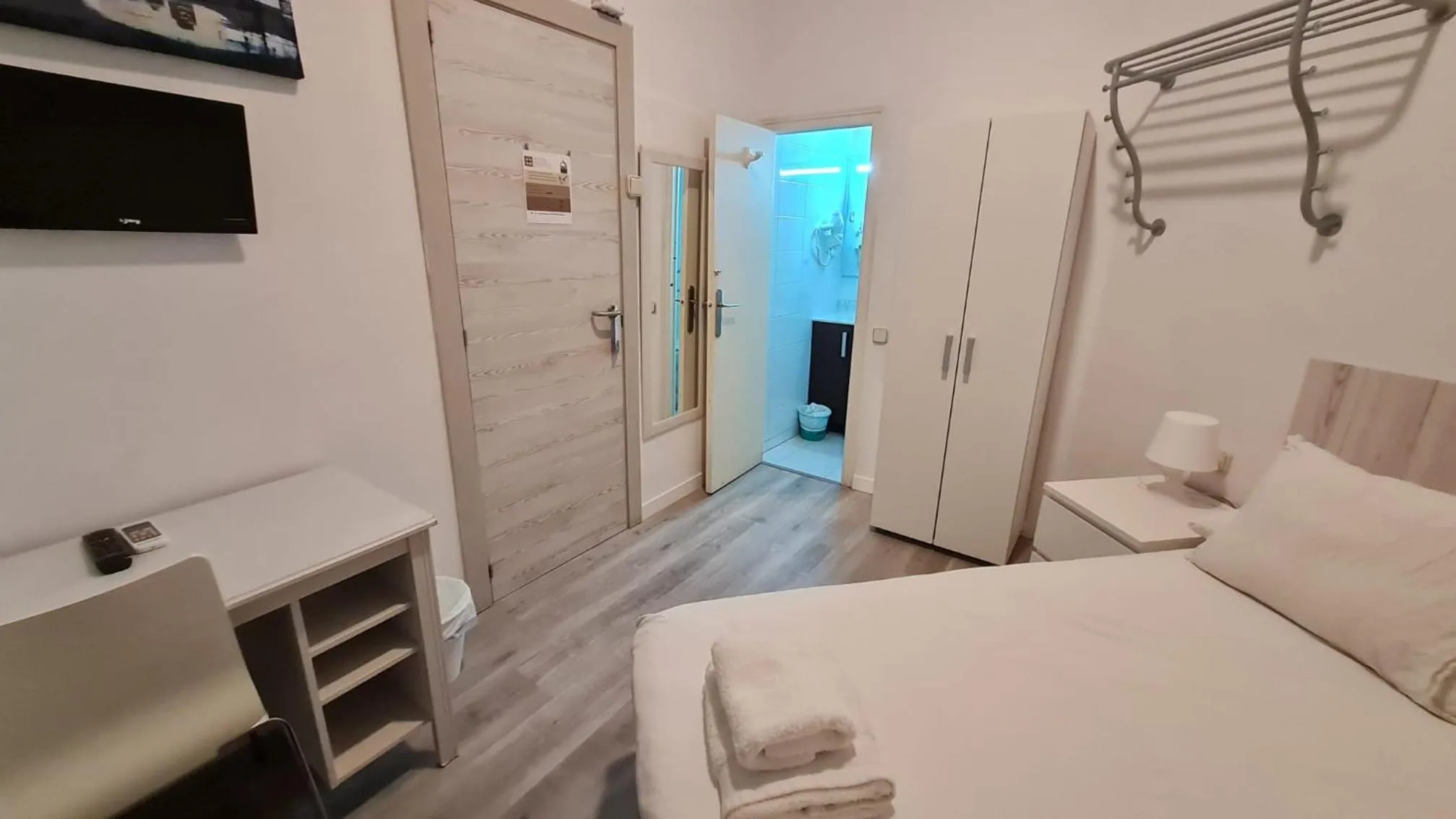 Photo of the whole room, Bed in Hostal Eixample