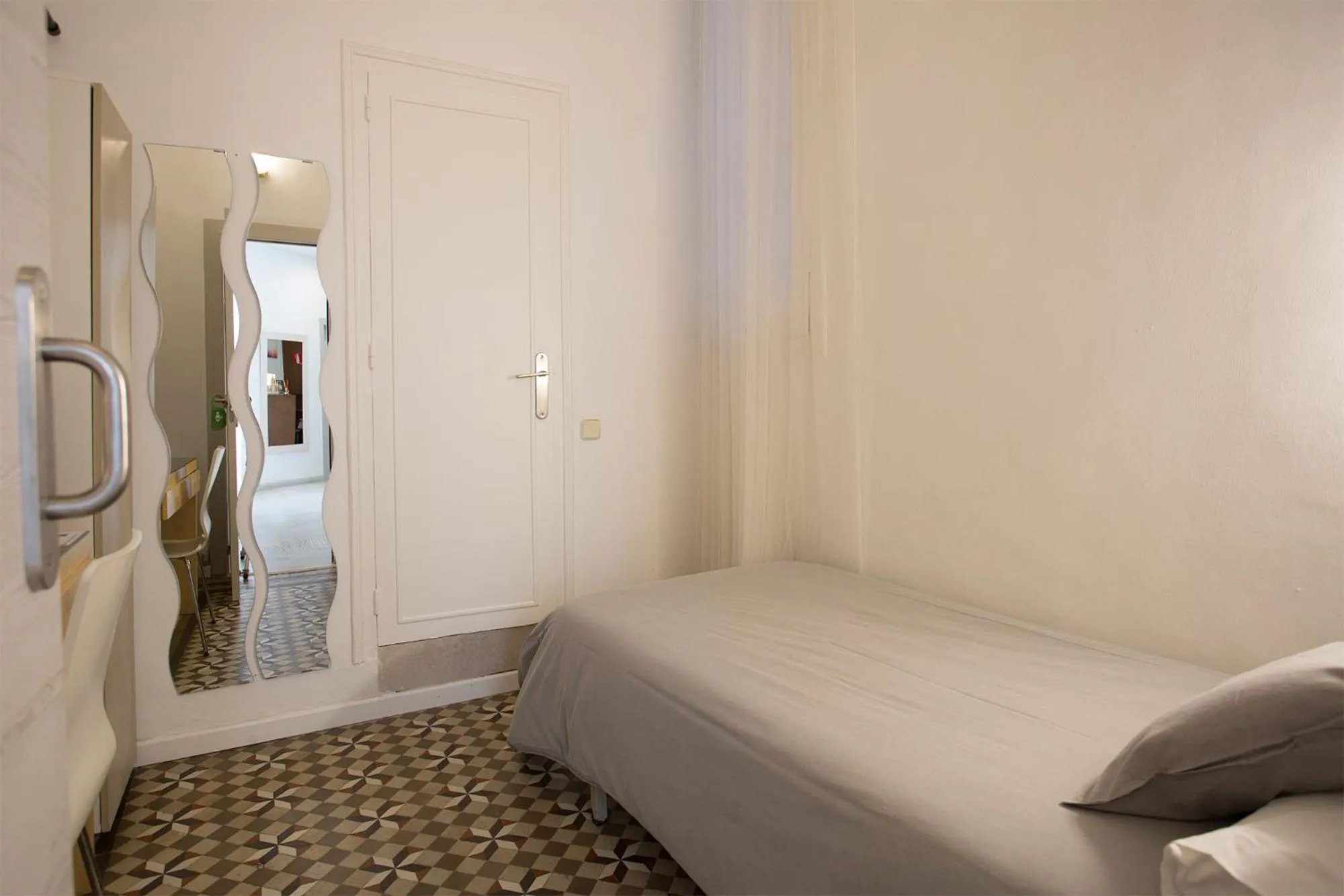 Photo of the whole room, Bed in Hostal Eixample