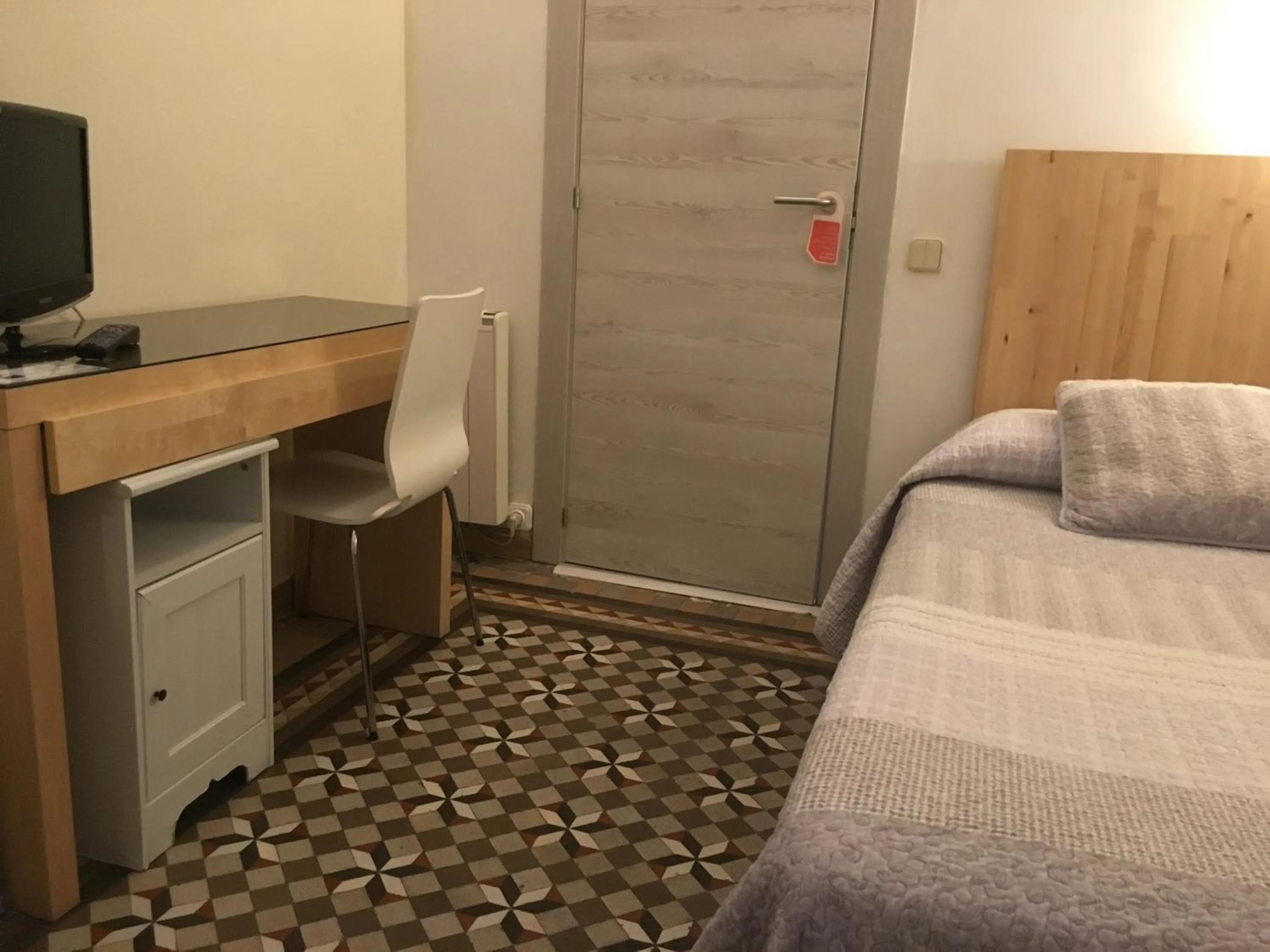 Photo of the whole room, Bed in Hostal Eixample