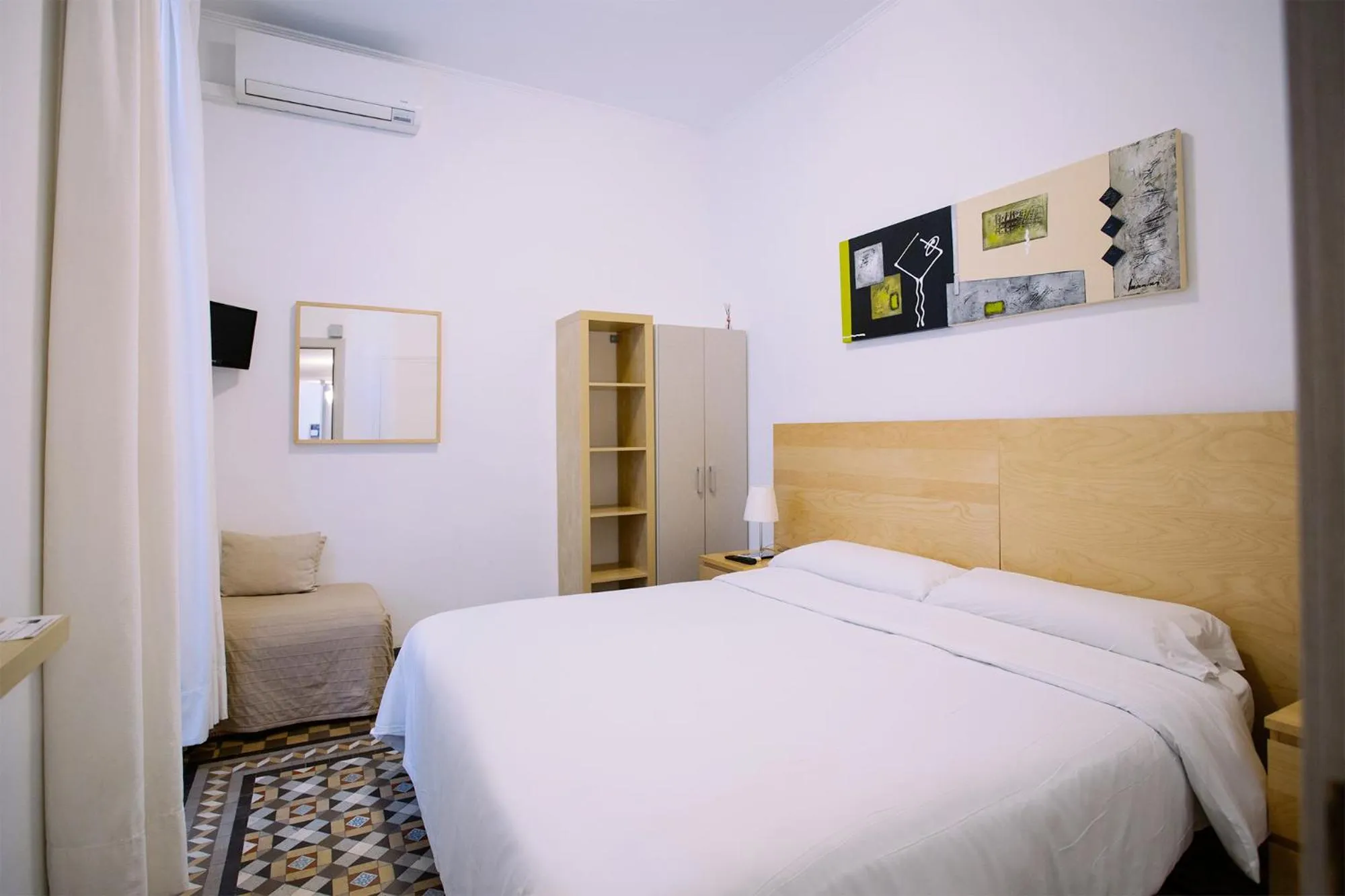 Bed in Hostal Eixample