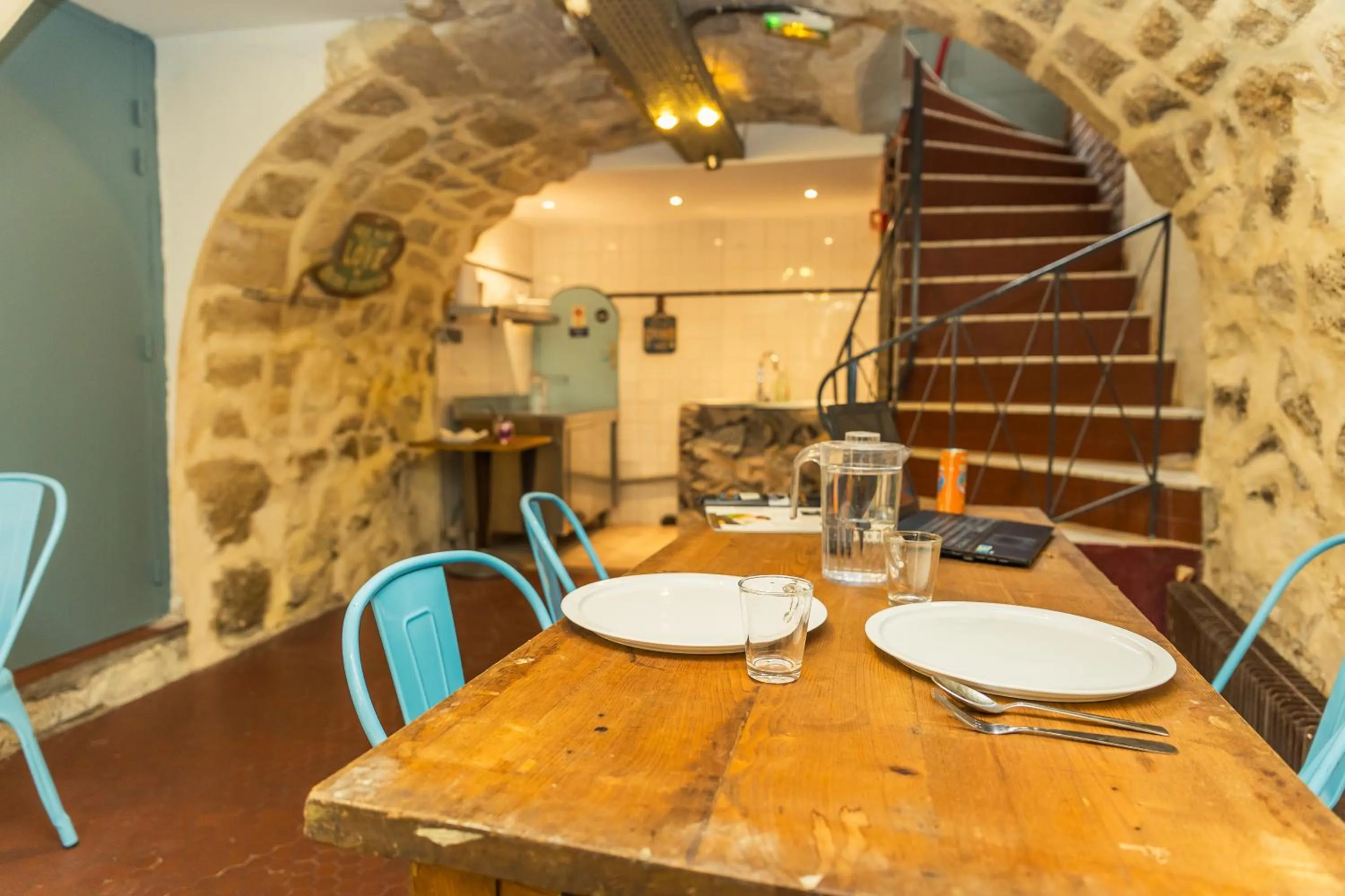 Seating area in Young and Happy Latin Quarter by Hiphophostels