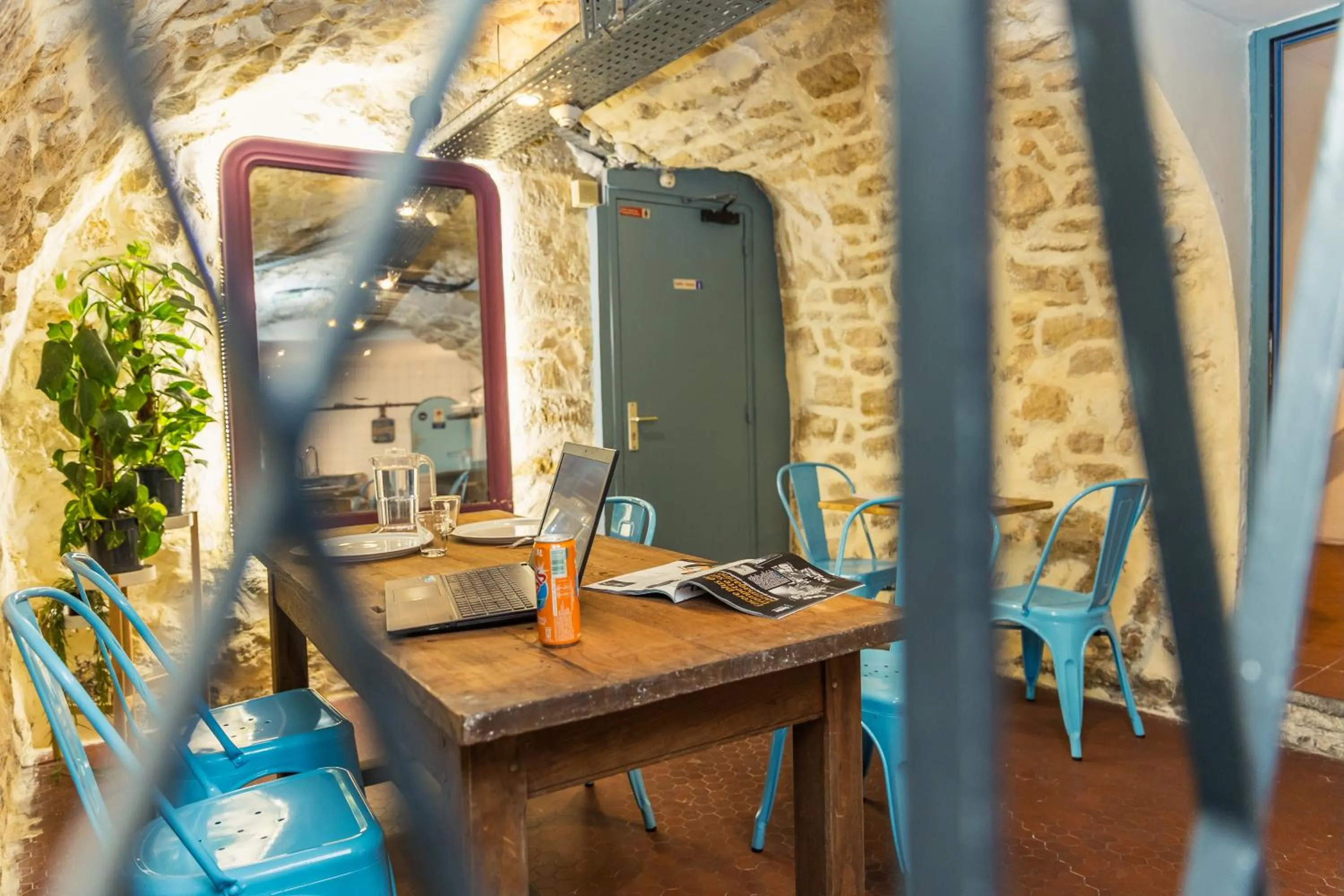 Seating area in Young and Happy Latin Quarter by Hiphophostels