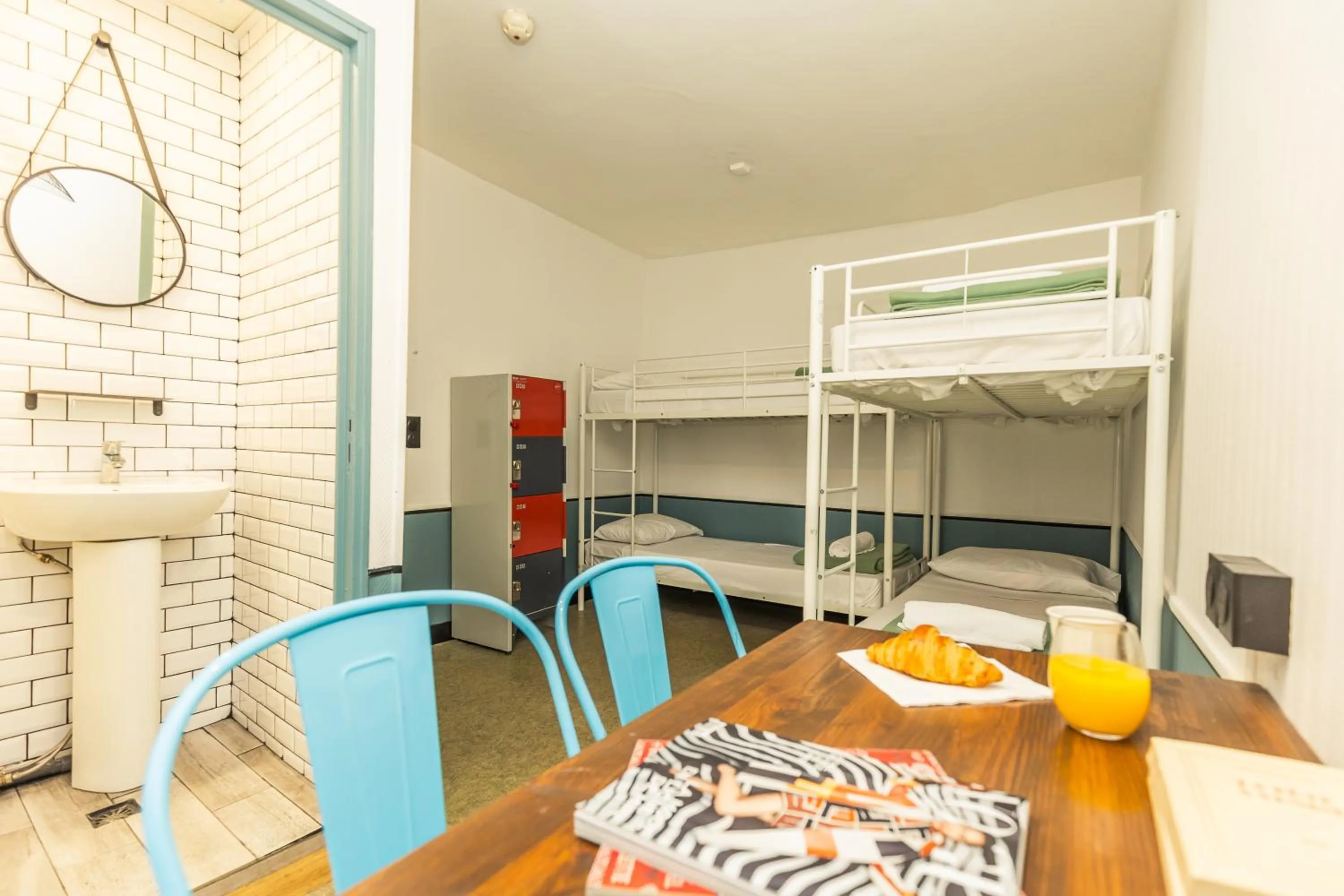 Photo of the whole room in Young and Happy Latin Quarter by Hiphophostels