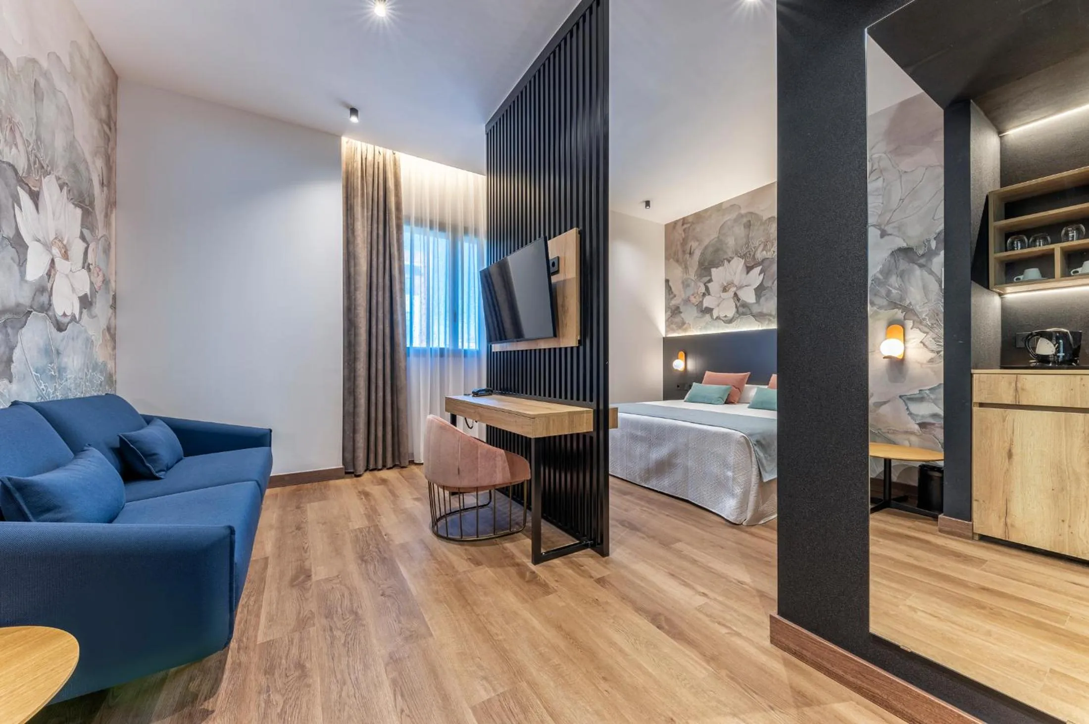 Seating area, Bed in UNIVERSA Hoteles